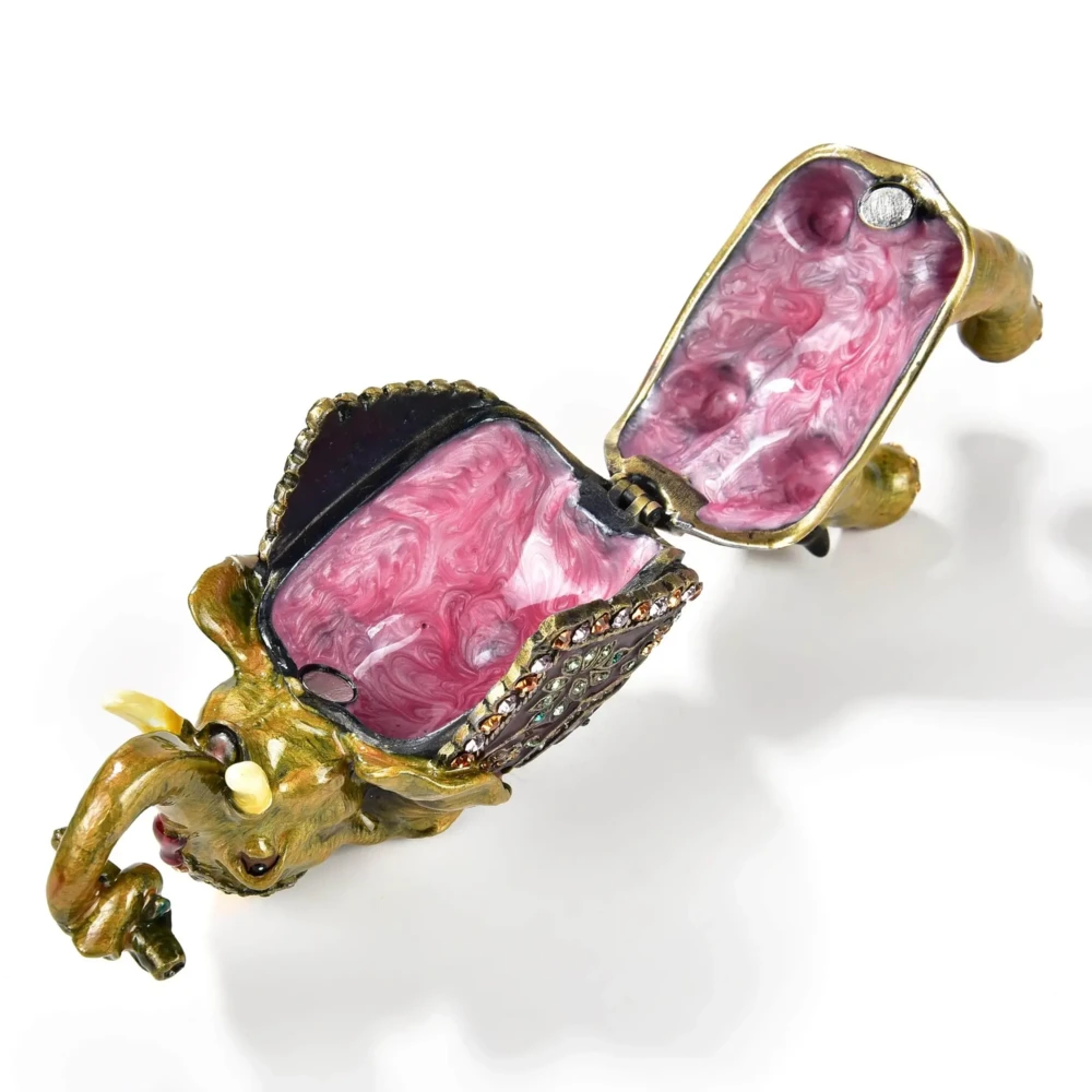 <font size="4"><span style="font-family: "EB Garamond";">Amethyst Elephant Figurine Jewel Box</span></font><div style="position: initial; margin: initial; font-family: "EB Garamond";"><font size="4"><br style="position: initial; margin: initial; font-family: "EB Garamond";"></font></div><div style="position: initial; margin: initial; font-family: "EB Garamond";"><p style="margin: initial; padding: 0px; border: 0px; font-family: "EB Garamond"; font-stretch: inherit; line-height: inherit; vertical-align: baseline; caret-color: rgb(51, 51, 51); color: rgb(51, 51, 51); text-size-adjust: auto; position: initial;"><font size="4">Enjoy this original, jeweled figurine box made with sparkling crystals.<br style="position: initial; margin: initial; font-family: "EB Garamond";"><br style="position: initial; margin: initial; font-family: "EB Garamond";">This trinket box is glazed with pearlized enamel and is perfect for displaying on your desk, vanity, bedroom, and office. The hand-set crystals bring out a special sparkle to wherever it is displayed.</font></p><p style="margin: initial; padding: 0px; border: 0px; font-family: "EB Garamond"; font-stretch: inherit; line-height: inherit; vertical-align: baseline; caret-color: rgb(51, 51, 51); color: rgb(51, 51, 51); text-size-adjust: auto; position: initial;"><font size="4"><br style="position: initial; margin: initial; font-family: "EB Garamond";">You will find a hidden hinge that opens up a secret compartment for your treasured jewelry, stones, and prized possessions.<br style="position: initial; margin: initial; font-family: "EB Garamond";"><br></font></p><p style="margin: initial; padding: 0px; border: 0px; font-family: "EB Garamond"; font-stretch: inherit; line-height: inherit; vertical-align: baseline; caret-color: rgb(51, 51, 51); color: rgb(51, 51, 51); text-size-adjust: auto; position: initial;"><font size="4">Height: 2.75 in.</font></p><p style="margin: initial; padding: 0px; border: 0px; font-family: "EB Garamond"; font-stretch: inherit; line-height: inherit; vertical-align: baseline; caret-color: rgb(51, 51, 51); color: rgb(51, 51, 51); text-size-adjust: auto; position: initial;"><font size="4">Length: 4 in.</font></p><p style="margin: initial; padding: 0px; border: 0px; font-family: "EB Garamond"; font-stretch: inherit; line-height: inherit; vertical-align: baseline; caret-color: rgb(51, 51, 51); color: rgb(51, 51, 51); text-size-adjust: auto; position: initial;"><font size="4">Width: 1.75 in.</font></p><p style="margin: initial; padding: 0px; border: 0px; font-family: "EB Garamond"; font-stretch: inherit; line-height: inherit; vertical-align: baseline; caret-color: rgb(51, 51, 51); color: rgb(51, 51, 51); text-size-adjust: auto; position: initial;"><font size="4">Weight: 360 grams.</font></p></div> Amethyst Elephant Figurine Jewel Box