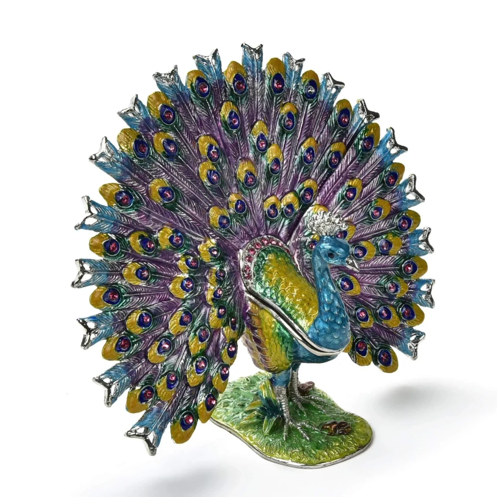 <font size="4"><span style="font-family: "EB Garamond";">Peacock Figurine Jewel Box</span></font><div style="position: initial; margin: initial; font-family: "EB Garamond";"><font size="4"><br style="position: initial; margin: initial; font-family: "EB Garamond";"></font></div><div style="position: initial; margin: initial; font-family: "EB Garamond";"><p style="margin: initial; padding: 0px; border: 0px; font-family: "EB Garamond"; font-stretch: inherit; line-height: inherit; vertical-align: baseline; caret-color: rgb(51, 51, 51); color: rgb(51, 51, 51); text-size-adjust: auto; position: initial;"><font size="4">Enjoy this original, jeweled figurine box made with sparkling crystals.<br style="position: initial; margin: initial; font-family: "EB Garamond";"><br style="position: initial; margin: initial; font-family: "EB Garamond";">This trinket box is glazed with pearlized enamel and is perfect for displaying on your desk, vanity, bedroom, and office. The hand-set crystals bring out a special sparkle to wherever it is displayed.</font></p><p style="margin: initial; padding: 0px; border: 0px; font-family: "EB Garamond"; font-stretch: inherit; line-height: inherit; vertical-align: baseline; caret-color: rgb(51, 51, 51); color: rgb(51, 51, 51); text-size-adjust: auto; position: initial;"><font size="4">Height: 4.25 inches.</font></p><p style="margin: initial; padding: 0px; border: 0px; font-family: "EB Garamond"; font-stretch: inherit; line-height: inherit; vertical-align: baseline; caret-color: rgb(51, 51, 51); color: rgb(51, 51, 51); text-size-adjust: auto; position: initial;"><font size="4"><br style="position: initial; margin: initial; font-family: "EB Garamond";">You will find a hidden hinge that opens up a secret compartment for your treasured jewelry, stones, and prized possessions.<br style="position: initial; margin: initial; font-family: "EB Garamond";"><br></font></p><p style="margin: initial; padding: 0px; border: 0px; font-family: "EB Garamond"; font-stretch: inherit; line-height: inherit; vertical-align: baseline; caret-color: rgb(51, 51, 51); color: rgb(51, 51, 51); text-size-adjust: auto; position: initial;"><font size="4">Height: 4.5 in.</font></p><p style="margin: initial; padding: 0px; border: 0px; font-family: "EB Garamond"; font-stretch: inherit; line-height: inherit; vertical-align: baseline; caret-color: rgb(51, 51, 51); color: rgb(51, 51, 51); text-size-adjust: auto; position: initial;"><font size="4">Length: 5 in.</font></p><p style="margin: initial; padding: 0px; border: 0px; font-family: "EB Garamond"; font-stretch: inherit; line-height: inherit; vertical-align: baseline; caret-color: rgb(51, 51, 51); color: rgb(51, 51, 51); text-size-adjust: auto; position: initial;"><font size="4">Width: 2.25 in.</font></p><p style="margin: initial; padding: 0px; border: 0px; font-family: "EB Garamond"; font-stretch: inherit; line-height: inherit; vertical-align: baseline; caret-color: rgb(51, 51, 51); color: rgb(51, 51, 51); text-size-adjust: auto; position: initial;"><font size="4">Weight: 257 grams.</font></p></div> Peacock Figurine Jewel Box