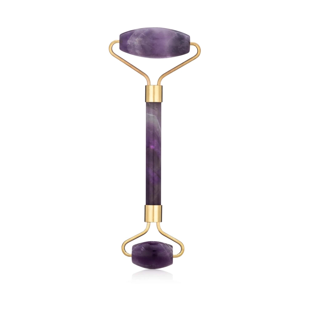 Chevron Amethyst Facial Roller With Gold Hardware<div style="position: initial; margin: initial;"><br style="position: initial; margin: initial;"></div><div style="position: initial; margin: initial;"><p style="margin: initial; padding: 0px; border: 0px; font-variant-numeric: inherit; font-variant-east-asian: inherit; font-stretch: inherit; font-size: 16px; line-height: inherit; font-family: "Avenir Next", sans-serif; vertical-align: baseline; color: rgb(51, 51, 51); position: initial;">Natural Chevron Amethyst face roller that assists lymphatic drainage to reduce the appearance of wrinkles, and puffiness. This roller acts as a massage tool for your face. You can use it alone or in conjunction with your skin care routine.</p><p style="margin: initial; padding: 0px; border: 0px; font-variant-numeric: inherit; font-variant-east-asian: inherit; font-stretch: inherit; font-size: 16px; line-height: inherit; font-family: "Avenir Next", sans-serif; vertical-align: baseline; color: rgb(51, 51, 51); position: initial;">Chevron Amethyst is a stone believed to bring great wealth and good fortune.</p><p style="margin: initial; padding: 0px; border: 0px; font-variant-numeric: inherit; font-variant-east-asian: inherit; font-stretch: inherit; font-size: 16px; line-height: inherit; font-family: "Avenir Next", sans-serif; vertical-align: baseline; color: rgb(51, 51, 51); position: initial;">Face rollers are excellent in assisting with the following:</p><ul style="margin: initial; padding: 0px; border: 0px; font-variant-numeric: inherit; font-variant-east-asian: inherit; font-stretch: inherit; font-size: 16px; line-height: inherit; font-family: "Avenir Next", sans-serif; vertical-align: baseline; color: rgb(51, 51, 51); position: initial;"><li style="margin: initial; padding: 0px; border: 0px; font: inherit; vertical-align: baseline; list-style: outside disc; position: initial;">Helps fight wrinkles </li><li style="margin: initial; padding: 0px; border: 0px; font: inherit; vertical-align: baseline; list-style: outside disc; position: initial;">Helps blood circulation to the face, and assists in detoxification </li><li style="margin: initial; padding: 0px; border: 0px; font: inherit; vertical-align: baseline; list-style: outside disc; position: initial;">Decreases puffiness under eyes and around face</li><li style="margin: initial; padding: 0px; border: 0px; font: inherit; vertical-align: baseline; list-style: outside disc; position: initial;">Brings a natural glow to your face</li><li style="margin: initial; padding: 0px; border: 0px; font: inherit; vertical-align: baseline; list-style: outside disc; position: initial;">Helps tighten skin, making it appear more youthful</li><li style="margin: initial; padding: 0px; border: 0px; font: inherit; vertical-align: baseline; list-style: outside disc; position: initial;">Helps absorb moisturizers and serums more fully</li></ul><p style="margin: initial; padding: 0px; border: 0px; font-variant-numeric: inherit; font-variant-east-asian: inherit; font-stretch: inherit; font-size: 16px; line-height: inherit; font-family: "Avenir Next", sans-serif; vertical-align: baseline; color: rgb(51, 51, 51); position: initial;">As each stone is one of a kind and unique, please allow for variations in color and texture in the face roller that you receive versus the one photographed. Your satisfaction is 100% guaranteed or your money back.</p><p style="margin: initial; padding: 0px; border: 0px; font-variant-numeric: inherit; font-variant-east-asian: inherit; font-stretch: inherit; font-size: 16px; line-height: inherit; font-family: "Avenir Next", sans-serif; vertical-align: baseline; color: rgb(51, 51, 51); position: initial;">Length: 6 inches.</p><p style="margin: initial; padding: 0px; border: 0px; font-variant-numeric: inherit; font-variant-east-asian: inherit; font-stretch: inherit; font-size: 16px; line-height: inherit; font-family: "Avenir Next", sans-serif; vertical-align: baseline; color: rgb(51, 51, 51); position: initial;">Width: 2 inches.</p></div> Chevron Amethyst Facial Roller With Gold Hardware