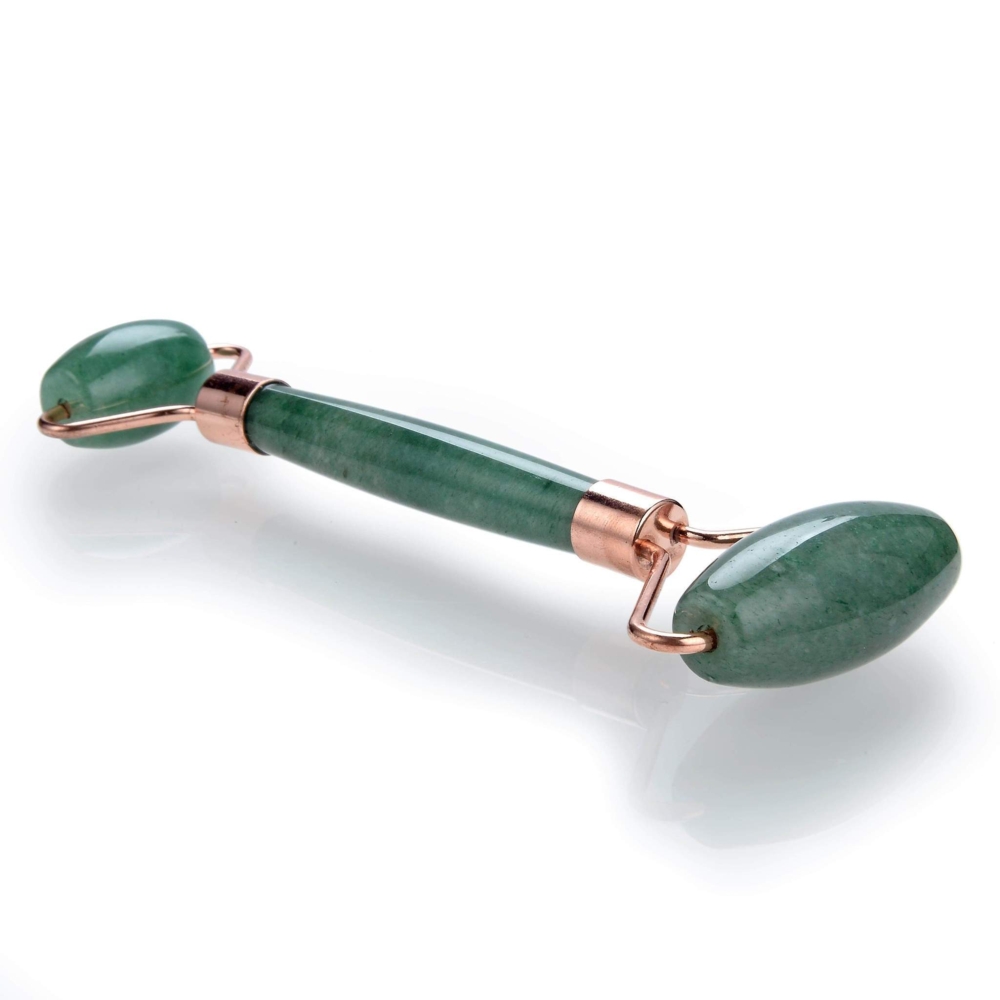 <span style="font-family: "EB Garamond";">Aventurine Facial Roller With Rose Gold Hardware</span><div style="position: initial; margin: initial; font-family: "EB Garamond";"><br style="position: initial; margin: initial; font-family: "EB Garamond";"></div><div style="position: initial; margin: initial; font-family: "EB Garamond";"><p style="margin: initial; padding: 0px; border: 0px; font-variant-numeric: inherit; font-variant-east-asian: inherit; font-stretch: inherit; font-size: 16px; line-height: inherit; font-family: "EB Garamond"; vertical-align: baseline; color: rgb(51, 51, 51); position: initial;">Natural Aventurine face roller that assists lymphatic drainage to reduce the appearance of wrinkles, and puffiness. This roller acts as a massage tool for your face. You can use it alone or in conjunction with your skin care routine.</p><p style="margin: initial; padding: 0px; border: 0px; font-variant-numeric: inherit; font-variant-east-asian: inherit; font-stretch: inherit; font-size: 16px; line-height: inherit; font-family: "EB Garamond"; vertical-align: baseline; color: rgb(51, 51, 51); position: initial;">Aventurine is a stone believed to bring great wealth and good fortune.</p><p style="margin: initial; padding: 0px; border: 0px; font-variant-numeric: inherit; font-variant-east-asian: inherit; font-stretch: inherit; font-size: 16px; line-height: inherit; font-family: "EB Garamond"; vertical-align: baseline; color: rgb(51, 51, 51); position: initial;">Face rollers are excellent in assisting with the following:</p><ul style="margin: initial; padding: 0px; border: 0px; font-variant-numeric: inherit; font-variant-east-asian: inherit; font-stretch: inherit; font-size: 16px; line-height: inherit; font-family: "EB Garamond"; vertical-align: baseline; color: rgb(51, 51, 51); position: initial;"><li style="margin: initial; padding: 0px; border: 0px; font-style: inherit; font-variant: inherit; font-weight: inherit; font-stretch: inherit; font-size: inherit; line-height: inherit; font-family: "EB Garamond"; vertical-align: baseline; list-style: outside disc; position: initial;">Helps fight wrinkles </li><li style="margin: initial; padding: 0px; border: 0px; font-style: inherit; font-variant: inherit; font-weight: inherit; font-stretch: inherit; font-size: inherit; line-height: inherit; font-family: "EB Garamond"; vertical-align: baseline; list-style: outside disc; position: initial;">Helps blood circulation to the face, and assists in detoxification </li><li style="margin: initial; padding: 0px; border: 0px; font-style: inherit; font-variant: inherit; font-weight: inherit; font-stretch: inherit; font-size: inherit; line-height: inherit; font-family: "EB Garamond"; vertical-align: baseline; list-style: outside disc; position: initial;">Decreases puffiness under eyes and around face</li><li style="margin: initial; padding: 0px; border: 0px; font-style: inherit; font-variant: inherit; font-weight: inherit; font-stretch: inherit; font-size: inherit; line-height: inherit; font-family: "EB Garamond"; vertical-align: baseline; list-style: outside disc; position: initial;">Brings a natural glow to your face</li><li style="margin: initial; padding: 0px; border: 0px; font-style: inherit; font-variant: inherit; font-weight: inherit; font-stretch: inherit; font-size: inherit; line-height: inherit; font-family: "EB Garamond"; vertical-align: baseline; list-style: outside disc; position: initial;">Helps tighten skin, making it appear more youthful</li><li style="margin: initial; padding: 0px; border: 0px; font-style: inherit; font-variant: inherit; font-weight: inherit; font-stretch: inherit; font-size: inherit; line-height: inherit; font-family: "EB Garamond"; vertical-align: baseline; list-style: outside disc; position: initial;">Helps absorb moisturizers and serums more fully</li></ul><p style="margin: initial; padding: 0px; border: 0px; font-variant-numeric: inherit; font-variant-east-asian: inherit; font-stretch: inherit; font-size: 16px; line-height: inherit; font-family: "EB Garamond"; vertical-align: baseline; color: rgb(51, 51, 51); position: initial;">As each stone is one of a kind and unique, please allow for variations in color and texture in the face roller that you receive versus the one photographed. Your satisfaction is 100% guaranteed or your money back.</p><p style="margin: initial; padding: 0px; border: 0px; font-variant-numeric: inherit; font-variant-east-asian: inherit; font-stretch: inherit; font-size: 16px; line-height: inherit; font-family: "EB Garamond"; vertical-align: baseline; color: rgb(51, 51, 51); position: initial;">Length: 6 inches.</p><p style="margin: initial; padding: 0px; border: 0px; font-variant-numeric: inherit; font-variant-east-asian: inherit; font-stretch: inherit; font-size: 16px; line-height: inherit; font-family: "EB Garamond"; vertical-align: baseline; color: rgb(51, 51, 51); position: initial;">Width: 2 inches.</p></div> Aventurine Facial Roller With Rose Gold Hardware