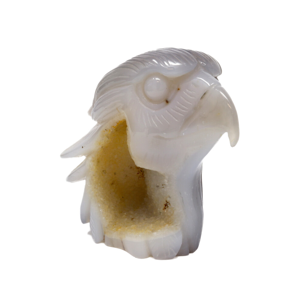 <span></span><span style="font-family: "EB Garamond";">Agate Geode Eagle Head Carving With Druze</span><div style="position: initial; margin: initial;"><br style="position: initial; margin: initial;"></div><div style="position: initial; margin: initial;"><span style="font-family: "EB Garamond"; position: initial; margin: initial;">The carving of this piece is spectacular! They took the time and attention to detail while carving this eagle head. Hand carved and polished out of a single piece of grey, blue and cream colored agate. There is a cream colored druze pocket on one side with black speckles. Druze is a formation of tiny crystals on the surface, or in the center of a larger crystal. This specimen will make a great conversation piece anywhere in your home or office. Agate Geodes are powerful crystals for good luck, protection and spiritual growth. Druze crystals have also been used to induce creativity and relaxation, as well as to help with emotional problems.</span><br style="position: initial; margin: initial;"></div> Agate Geode Eagle Head Carving With Druze