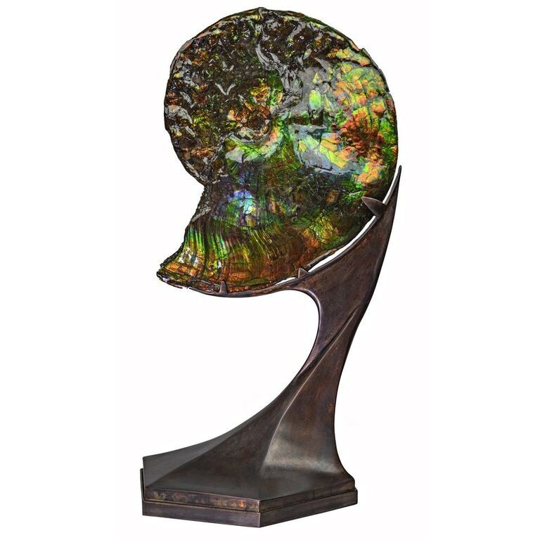 <font size="4"><span style="font-family: "EB Garamond";"><font size="4"><span style="font-family: "EB Garamond";"><font size="4">Ammolite on custom 360 degree rotating stand. Ammolite is the name given to the colorful and naturally opalized Ammonite fossils found in Southern Alberta, Canada. These unique and rare treasures can only be found in one location worldwide - in the famous Bear Paw Formation in the southwest region of Alberta.</font></span></font></span></font> Ammonite And Ammolite Fossil In Custom Spinning Futuristic Stand