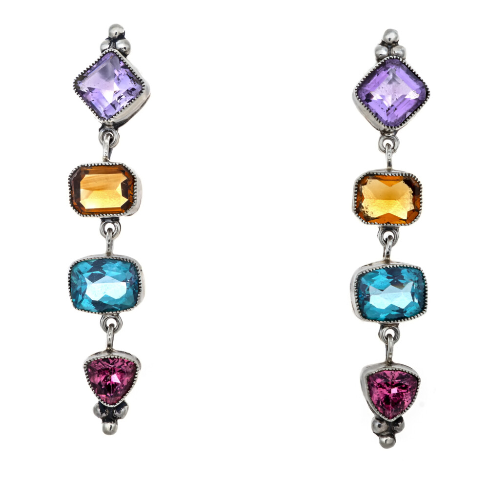 <span style="font-family: "EB Garamond"; color: rgb(0, 0, 0);"><font style="font-family: "EB Garamond"; color: rgb(0, 0, 0);" size="4">Multi Gemstone Dangle Earrings On-post - Faceted Amethyst & Citrine With Blue Topaz & Pink Tourmaline</font></span><div style="font-family: "EB Garamond"; color: rgb(0, 0, 0);"><span style="font-family: "EB Garamond"; color: rgb(0, 0, 0);"><font style="font-family: "EB Garamond"; color: rgb(0, 0, 0);" size="4">These earring pair perfect with other gemstone jewelry and make a major statement! The clarity of these stones are breathtaking. They are light colorful dangles perfect for any occasion. These are one of a kind and cannot be found in any other store. Get them before they are gone. Set in sterling silver. </font></span></div> Multi Gemstone Dangle Earrings On-post - Faceted Amethyst & Citrine With Blue Topaz & Pink Tourmaline