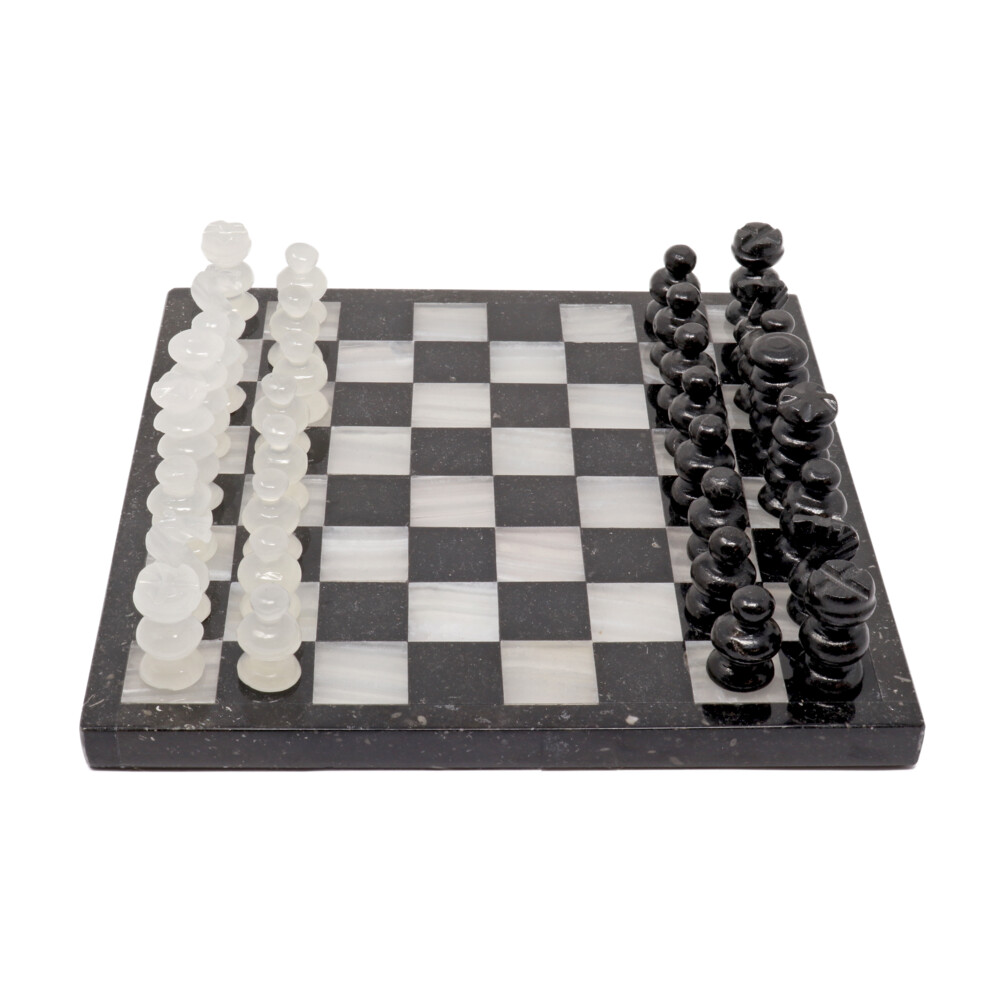<span style="font-family: "EB Garamond"; position: initial; margin: initial; color: rgb(0, 0, 0);"><font size="4" style="position: initial; margin: initial; font-family: "EB Garamond"; color: rgb(0, 0, 0);">Onyx Chess Set Black/ White</font></span><div style="position: initial; margin: initial; font-family: "EB Garamond"; color: rgb(0, 0, 0);"><font size="4" style="position: initial; margin: initial; font-family: "EB Garamond"; color: rgb(0, 0, 0);"><span style="color: rgb(0, 0, 0); font-family: "EB Garamond"; position: initial; margin: initial;">whether you use this chess table as decoration or use it to its full potential in a challenging game of chess, a fun board game for the whole family! Challenge your mind and create your own strategies with one of the most well-known board games out there. The origin of chess remains a matter of controversy. There is no credible evidence that chess existed in a form approaching the modern game before the 6th century </span><span style="text-transform: uppercase; color: rgb(0, 0, 0); font-family: "EB Garamond"; position: initial; margin: initial;">CE</span><span style="color: rgb(0, 0, 0); font-family: "EB Garamond"; position: initial; margin: initial;">. Game pieces found in </span><a href="https://www.britannica.com/place/Russia" style="color: rgb(0, 0, 0); font-family: "EB Garamond"; bad-style: rgb(255, 255, 255); position: initial; margin: initial;">Russia</a><span style="color: rgb(0, 0, 0); font-family: "EB Garamond"; position: initial; margin: initial;">, </span><a href="https://www.britannica.com/place/China" style="color: rgb(0, 0, 0); font-family: "EB Garamond"; bad-style: rgb(255, 255, 255); position: initial; margin: initial;">China</a><span style="color: rgb(0, 0, 0); font-family: "EB Garamond"; position: initial; margin: initial;">, </span><a href="https://www.britannica.com/place/India" style="color: rgb(0, 0, 0); font-family: "EB Garamond"; bad-style: rgb(255, 255, 255); position: initial; margin: initial;">India</a><span style="color: rgb(0, 0, 0); font-family: "EB Garamond"; position: initial; margin: initial;">, </span><a href="https://www.britannica.com/topic/history-of-Central-Asia-102306" style="color: rgb(0, 0, 0); font-family: "EB Garamond"; bad-style: rgb(255, 255, 255); position: initial; margin: initial;">Central Asia</a><span style="color: rgb(0, 0, 0); font-family: "EB Garamond"; position: initial; margin: initial;">, </span><a href="https://www.britannica.com/place/Pakistan" style="color: rgb(0, 0, 0); font-family: "EB Garamond"; bad-style: rgb(255, 255, 255); position: initial; margin: initial;">Pakistan</a><span style="color: rgb(0, 0, 0); font-family: "EB Garamond"; position: initial; margin: initial;">, and elsewhere that have been determined to be older than that are now regarded as coming from earlier distantly related board </span><a href="https://www.britannica.com/topic/game-recreation" style="color: rgb(0, 0, 0); font-family: "EB Garamond"; bad-style: rgb(255, 255, 255); position: initial; margin: initial;">games</a><span style="color: rgb(0, 0, 0); font-family: "EB Garamond"; position: initial; margin: initial;">, often involving </span><a href="https://www.britannica.com/topic/dice" style="color: rgb(0, 0, 0); font-family: "EB Garamond"; bad-style: rgb(255, 255, 255); position: initial; margin: initial;">dice</a><span style="color: rgb(0, 0, 0); font-family: "EB Garamond"; position: initial; margin: initial;"> and sometimes using playing boards of 100 or more squares.<font size="4" style="font-family: "EB Garamond"; color: rgb(0, 0, 0); position: initial; margin: initial;"> </font></span></font><span style="font-family: "EB Garamond"; position: initial; margin: initial; color: rgb(0, 0, 0);"><font size="4" style="position: initial; margin: initial; font-family: "EB Garamond"; color: rgb(0, 0, 0);"><span style="color: rgb(0, 0, 0); font-family: "EB Garamond"; position: initial; margin: initial;"><font size="4" style="font-family: "EB Garamond"; color: rgb(0, 0, 0); position: initial; margin: initial;">Onyx is an excellent stone for stressful or challenging situations as it gives us strength and support. It’s soothing qualities alleviate fear and worries and encourage wise decision-making. Onyx is known to increase happiness, intuition and good fortune. It is known to help us change bad habits and keep emotions under control. Onyx helps us to focus and stay grounded</font></span><span style="color: rgb(0, 0, 0); font-family: "EB Garamond"; font-size: 14px; position: initial; margin: initial;">.</span><br style="position: initial; margin: initial;"></font></span></div><div style="position: initial; margin: initial; font-family: "EB Garamond"; color: rgb(0, 0, 0);"><span style="font-family: "EB Garamond"; position: initial; margin: initial; color: rgb(0, 0, 0);"><font size="4" style="position: initial; margin: initial; font-family: "EB Garamond"; color: rgb(0, 0, 0);"><span style="color: rgb(0, 0, 0); font-family: "EB Garamond"; font-size: 14px; position: initial; margin: initial;"><br style="position: initial; margin: initial;"></span></font></span></div><div style="position: initial; margin: initial; font-family: "EB Garamond"; color: rgb(0, 0, 0);"><span style="font-family: "EB Garamond"; position: initial; margin: initial; color: rgb(0, 0, 0);"><font size="4" style="position: initial; margin: initial; font-family: "EB Garamond"; color: rgb(0, 0, 0);"><span style="color: rgb(0, 0, 0); font-family: "EB Garamond"; font-size: 14px; position: initial; margin: initial;"><span style="font-size: 16.8px; position: initial; margin: initial;">As this is a one of a kind item made from stone, no two are alike. Please allow for variations in color and design in the piece that you receive. Your satisfaction is 100% guaranteed.</span><br style="position: initial; margin: initial;"></span></font></span></div> Onyx Chess Set Black/ White