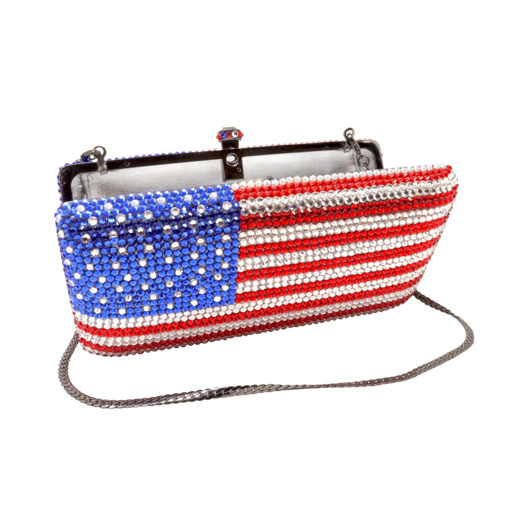 <font face="EB Garamond"><font size="4"><span style="font-family: "EB Garamond"; color: rgb(0, 0, 0);"><span style="color: rgb(68, 68, 68);">If you are looking for the perfectly striking accessory that will help express your gratitude to those who have served and those who are serving our country today, then you've found your perfect match! This stunning American Flag jewel purse is no doubt the perfect piece to own if you're a proud American and you aren't afraid to show it! The appreciation for our amazing country does not go unseen, and what better way to show your appreciation than with a stylish accessory! Great for a night our or a 4th of July celebration, give the fireworks a run for their money and steal the show! This clutch will hold all of your essentials for any occasion, keep your night out necessities safe with the sturdy stainless steel latch that keeps this clutch shut tight. Don't miss your chance to own such a unique and eye-catching clutch!</span></span></font></font> American Flag Jewel Purse With Chain