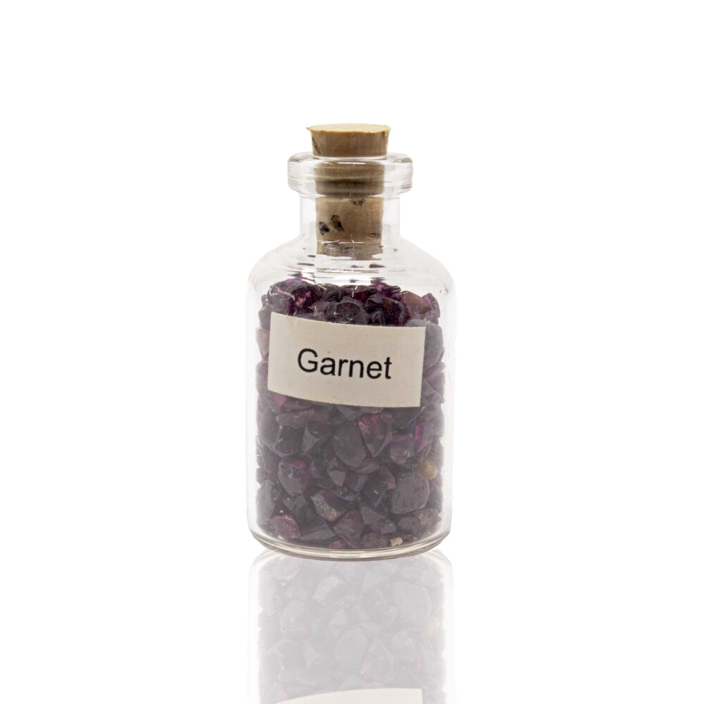 <font face="EB Garamond" size="4"><span style="font-family: "EB Garamond";">This small cork bottle has gorgeous tumbled Garnet stones inside. Garnet is found in metamorphic rocks on every continent. All garnets have essentially the same crystal structure, but they vary in chemical composition. Garnet has been used to release bad karma, protect from evil, rid nightmares, and heal wounds. A stone of regeneration and energizing; it can boost the energy of an entire system and revitalize it. Garnet is the birthstone of January making this a perfect gift to your winter-born loved ones! </span></font><div><font face="EB Garamond" size="4"><span style="font-family: "EB Garamond";">Please note: due to the nature of gemstones, each mineral specimen may slightly vary in size, shape or color. If you have any questions, please contact us and we will try our best to assist you. </span></font></div> Individual Gemstone Bottle -Garnet