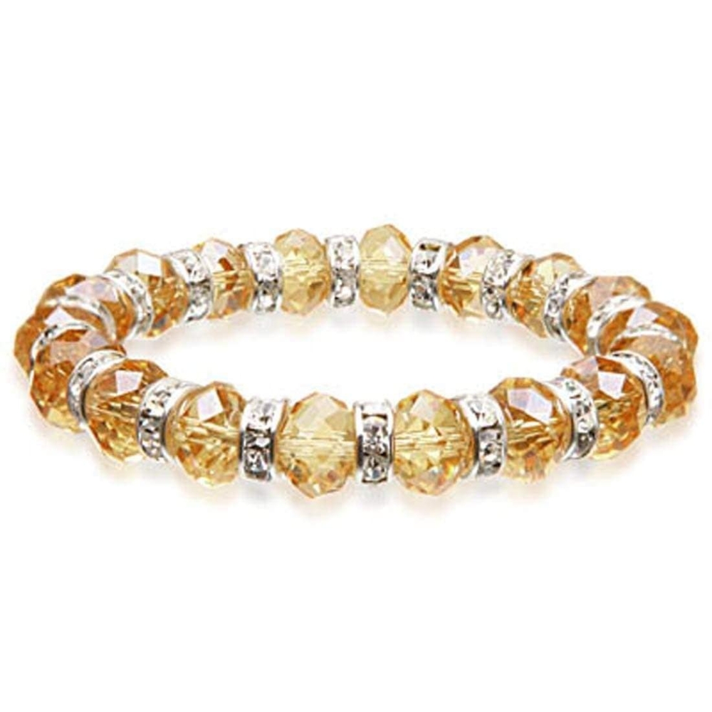 <span style="font-family: "EB Garamond"; position: initial; margin: initial;">Crystal Bracelet - Green Gold </span><span style="font-family: "EB Garamond"; font-size: 16.8px; position: initial; margin: initial;">Color</span><div style="position: initial; margin: initial; font-family: "EB Garamond";"><br style="position: initial; margin: initial; font-family: "EB Garamond";"></div><div style="position: initial; margin: initial; font-family: "EB Garamond";"><p style="margin: initial; padding: 0px; border: 0px; font-variant-numeric: inherit; font-variant-east-asian: inherit; font-stretch: inherit; line-height: inherit; vertical-align: baseline; position: initial; font-family: "EB Garamond";"><font style="position: initial; margin: initial; font-family: "EB Garamond";"><font size="4" style="position: initial; margin: initial; font-family: "EB Garamond";">Each glass bead is faceted and sparkles as the light touches it. The beads are </font><font style="position: initial; margin: initial; font-family: "EB Garamond";"><span style="font-size: 16.8px; position: initial; margin: initial; font-family: "EB Garamond";">separated</span></font><font size="4" style="position: initial; margin: initial; font-family: "EB Garamond";"> by channel-set cubic zirconia crystals encased in rhodium plated spacers.</font></font></p><p style="margin: initial; padding: 0px; border: 0px; font-variant-numeric: inherit; font-variant-east-asian: inherit; font-stretch: inherit; line-height: inherit; vertical-align: baseline; position: initial; font-family: "EB Garamond";"><font style="position: initial; margin: initial; font-family: "EB Garamond";"><font size="4" style="position: initial; margin: initial; font-family: "EB Garamond";">This glass bracelet is perfect for a casual day with your friends, or a piece of </font><font style="position: initial; margin: initial; font-family: "EB Garamond";"><span style="font-size: 16.8px; position: initial; margin: initial; font-family: "EB Garamond";">jewelry</span></font><font size="4" style="position: initial; margin: initial; font-family: "EB Garamond";"> perfect for a formal event.</font></font></p><p style="margin: initial; padding: 0px; border: 0px; font-variant-numeric: inherit; font-variant-east-asian: inherit; font-stretch: inherit; line-height: inherit; font-family: "EB Garamond"; vertical-align: baseline; color: rgb(51, 51, 51); position: initial;"><font size="4" style="position: initial; margin: initial;">This bracelet is comfortable as it is secured by a strong elastic band that allows it to sit comfortably on most adult wrists and expand as needed.</font></p><p style="margin: initial; padding: 0px; border: 0px; font-variant-numeric: inherit; font-variant-east-asian: inherit; font-stretch: inherit; line-height: inherit; font-family: "EB Garamond"; vertical-align: baseline; color: rgb(51, 51, 51); position: initial;"><font size="4" style="position: initial; margin: initial;">Bracelet length - 8"</font></p></div> Crystal Bracelet - Green Gold Color