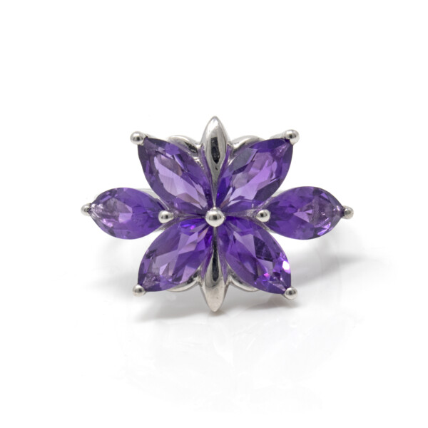 Closeup photo of Amethyst Ring Size 9 - with 6 Faceted Sharp Ovals In Shape Of Magnolia - Prong Set With Raised Silver Bezel