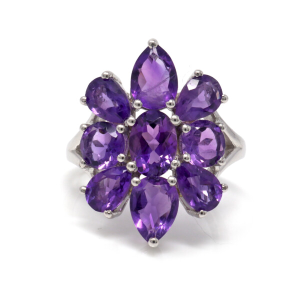 Closeup photo of Amethyst Ring Size 5 - with 9 Faceted Stones In Shape Of Dahlia Flower Set On Silver Band With Cutout Top - Prong Set