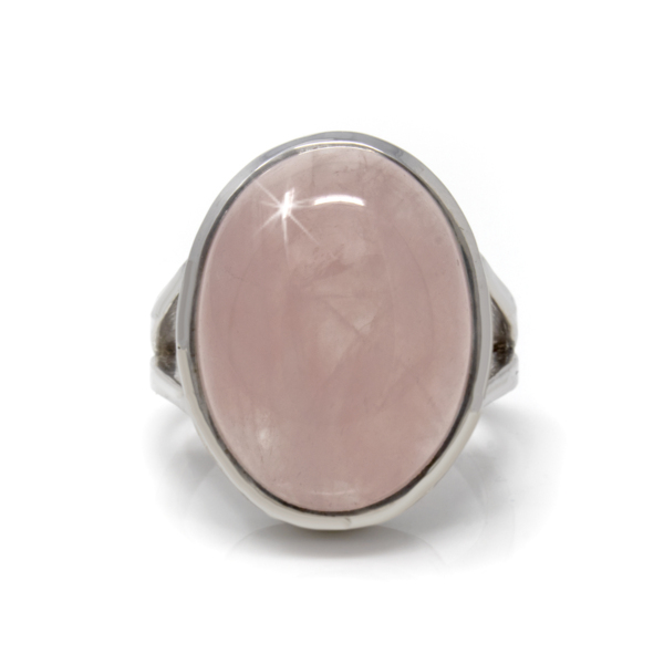 Closeup photo of Rose Quartz Ring Size 7 - Simple Oval Cabochon With Tall Silver Bezel & Narrow Cut Out On Band Top