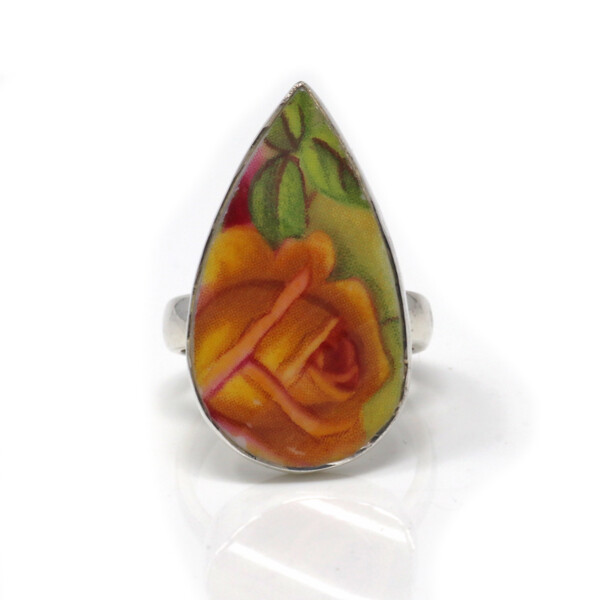 Closeup photo of Porcelain Rose Ring Size 8 - Pear With Silver Bezel & Marigold Hued Rose