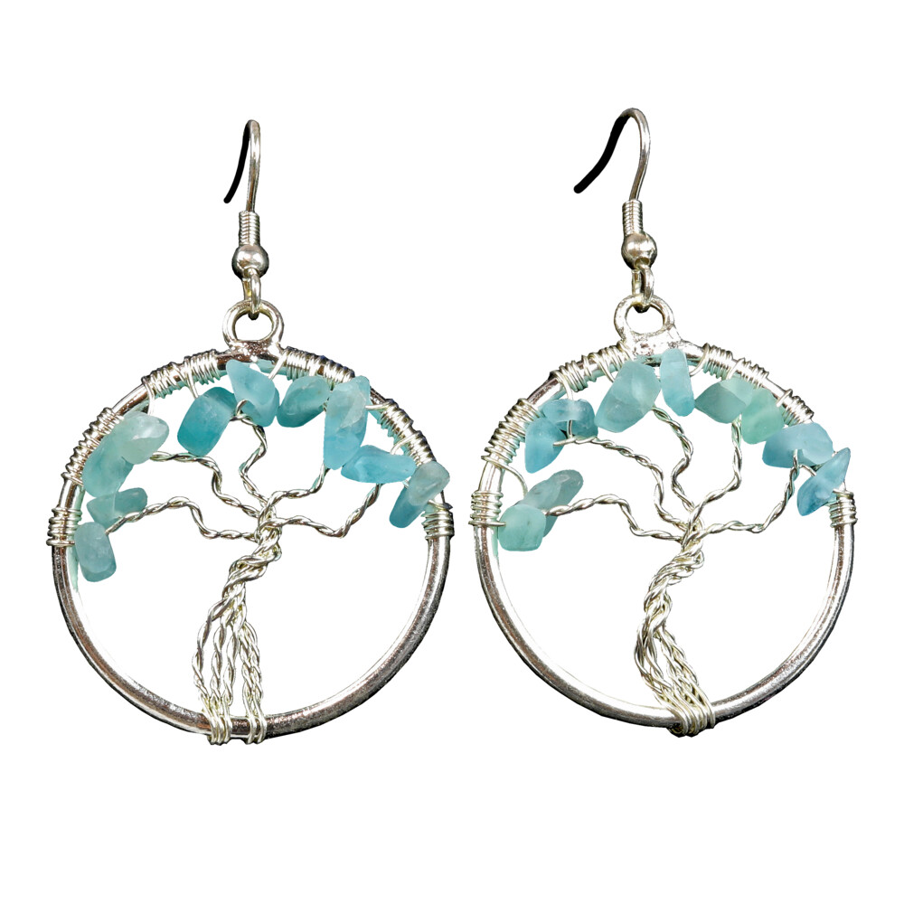 <font size="4" style="position: initial; margin: initial;"><span style="font-family: "EB Garamond"; position: initial; margin: initial;"><font size="4" style="position: initial; margin: initial;">Blue Apatite Tree Of Life Earrings</font></span></font><div style="position: initial; margin: initial;"><p style="margin: initial; font-variant-numeric: normal; font-variant-east-asian: normal; font-stretch: normal; line-height: normal; font-family: "Helvetica Neue"; color: rgb(0, 0, 0); position: initial;"><span style="font-family: "EB Garamond";"><font size="4">Each item is unique and one of a kind. Nature's treasures do vary in their shape and color.</font></span></p><div style="position: initial; margin: initial; font-family: "EB Garamond";"><font size="4" style="position: initial; margin: initial;"><br style="position: initial; margin: initial; font-family: "EB Garamond";"></font></div><div style="position: initial; margin: initial; font-family: "EB Garamond";"><p style="margin: initial; font-variant-numeric: normal; font-variant-east-asian: normal; font-stretch: normal; line-height: normal; font-family: "EB Garamond"; color: rgb(0, 0, 0); position: initial;"><span style="position: initial; margin: initial; font-family: "EB Garamond";"><font size="4" style="position: initial; margin: initial;">BLUE APATITE</font></span></p><p style="margin: initial; font-variant-numeric: normal; font-variant-east-asian: normal; font-stretch: normal; line-height: normal; font-family: "EB Garamond"; color: rgb(0, 0, 0); position: initial;"><font size="4" style="position: initial; margin: initial;">“</font><span style="font-size: 1.2rem; position: initial; margin: initial;">Gem of Manifestation</span><span style="font-size: 1.2rem; position: initial; margin: initial;">”</span></p><p style="margin: initial; font-variant-numeric: normal; font-variant-east-asian: normal; font-stretch: normal; line-height: normal; font-family: "EB Garamond"; color: rgb(0, 0, 0); position: initial;"><span style="position: initial; margin: initial; font-family: "EB Garamond";"><font size="4" style="position: initial; margin: initial;">Apatite </font></span><span style="font-size: 1.2rem; position: initial; margin: initial;">is a group of phosphate minerals with high concentrations of</span></p><p style="margin: initial; font-variant-numeric: normal; font-variant-east-asian: normal; font-stretch: normal; line-height: normal; font-family: "EB Garamond"; color: rgb(0, 0, 0); position: initial;"><font size="4" style="position: initial; margin: initial;">hydroxide, fluoride and chloride ions. Commonly mistaken for other</font></p><p style="margin: initial; font-variant-numeric: normal; font-variant-east-asian: normal; font-stretch: normal; line-height: normal; font-family: "EB Garamond"; color: rgb(0, 0, 0); position: initial;"><font size="4" style="position: initial; margin: initial;">minerals, this affinity is represented in its name; derived from the</font></p><p style="margin: initial; font-variant-numeric: normal; font-variant-east-asian: normal; font-stretch: normal; line-height: normal; font-family: "EB Garamond"; color: rgb(0, 0, 0); position: initial;"><font size="4" style="position: initial; margin: initial;">Greek word apatein meaning to deceive or be misleading. Gem quality</font></p><p style="margin: initial; font-variant-numeric: normal; font-variant-east-asian: normal; font-stretch: normal; line-height: normal; font-family: "EB Garamond"; color: rgb(0, 0, 0); position: initial;"><font size="4" style="position: initial; margin: initial;">Apaptite can be found in Brazil, Burma & Mexico, though other sources </font><span style="font-size: 1.2rem; position: initial; margin: initial;">include Madagascar, Germany & United States. Apatite encourages one </span><span style="font-size: 1.2rem; position: initial; margin: initial;">to be helpful in a more humanitarian way. It also helps one to gain </span><span style="font-size: 1.2rem; position: initial; margin: initial;">self-confidence and acceptance of one’s true nature. Working through </span><span style="font-size: 1.2rem; position: initial; margin: initial;">the third eye and throat chakras, Apatite stimulates deep meditation.</span></p></div></div> Blue Apatite Tree Of Life Earrings