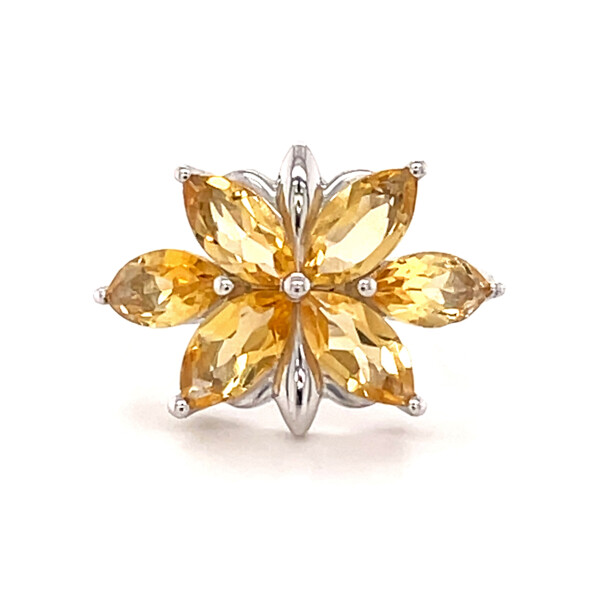 Closeup photo of Citrine Ring Size 7 - Faceted Sharp Oval Flower With Silver Beading & Stamen With Silver Bezel