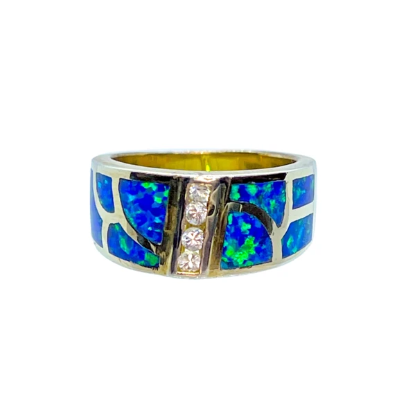 Closeup photo of Blue Opal Ring Size 6 - Wide Band With White Cz Trio & Curved Inlay Sections - Gold Plated
