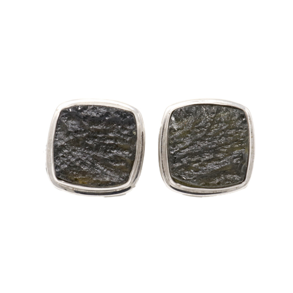 <span style=""></span><span style="font-family: "EB Garamond";"><span style="font-family: "EB Garamond";"><font size="4">These cuff links are a gorgeous forest-green color of the stone Moldavite. Found only in Czechoslovakia, Moldavite is a rare stone that is approximately 14.8 million years old and is a member of the tektite group; natural glasses formed from interplanetary collisions. Moldavite can work as powerful aid for meditation and dream work. It increases ones sensitivity to guidance and intuition and promotes success, making it a great gift for a loved one. </font></span></span><br style=""> Moldavite Cufflinks