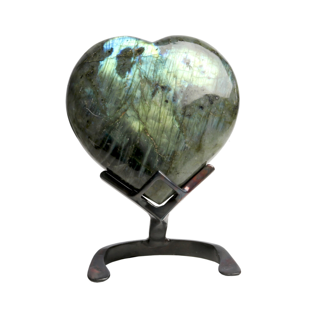 <font size="4"><span style="font-family: "EB Garamond";">Labradorite Heart In Custom Stand</span></font><div><font face="EB Garamond">Beautiful and flashy.<br></font><font size="4"></font><div style="position: initial; margin: initial; font-family: "EB Garamond";"><font size="4"><br style="position: initial; margin: initial; font-family: "EB Garamond";"></font></div><div style="position: initial; margin: initial; font-family: "EB Garamond";"><p style="margin: initial; font-variant-numeric: normal; font-variant-east-asian: normal; font-stretch: normal; line-height: normal; font-family: "EB Garamond"; color: rgb(0, 0, 0); position: initial;"><font size="4">“Gem of Voice”</font></p><p style="margin: initial; font-variant-numeric: normal; font-variant-east-asian: normal; font-stretch: normal; line-height: normal; font-family: "EB Garamond"; color: rgb(0, 0, 0); position: initial;"><font size="4"><span style="position: initial; margin: initial; font-family: "EB Garamond";">Labradorite</span><b style="position: initial; margin: initial; font-family: "EB Garamond";"> </b>is a form of feldspar with striated tabular crystallization</font></p><p style="margin: initial; font-variant-numeric: normal; font-variant-east-asian: normal; font-stretch: normal; line-height: normal; font-family: "EB Garamond"; color: rgb(0, 0, 0); position: initial;"><font size="4">patterns. Meaning that with the perfect angle of light hitting the fine</font></p><p style="margin: initial; font-variant-numeric: normal; font-variant-east-asian: normal; font-stretch: normal; line-height: normal; font-family: "EB Garamond"; color: rgb(0, 0, 0); position: initial;"><font size="4">layers, an exhilarating feeling can be achieved by the iridescent</font></p><p style="margin: initial; font-variant-numeric: normal; font-variant-east-asian: normal; font-stretch: normal; line-height: normal; font-family: "EB Garamond"; color: rgb(0, 0, 0); position: initial;"><font size="4">reflections that naturally lie within this mysterious stone. Find yours!</font></p><p style="margin: initial; font-variant-numeric: normal; font-variant-east-asian: normal; font-stretch: normal; line-height: normal; font-family: "EB Garamond"; color: rgb(0, 0, 0); position: initial;"><font size="4">With Labradorite’s iridescent and sometimes rainbow-like flashes of</font></p><p style="margin: initial; font-variant-numeric: normal; font-variant-east-asian: normal; font-stretch: normal; line-height: normal; font-family: "EB Garamond"; color: rgb(0, 0, 0); position: initial;"><font size="4">color, it can be very beneficial in uniting all the chakras. While lighter</font></p><p style="margin: initial; font-variant-numeric: normal; font-variant-east-asian: normal; font-stretch: normal; line-height: normal; font-family: "EB Garamond"; color: rgb(0, 0, 0); position: initial;"><font size="4">shades of blue carry the power of flexibility, relaxation, and balance;</font></p><p style="font-variant-numeric: normal; font-variant-east-asian: normal; font-stretch: normal; line-height: normal; font-family: "EB Garamond"; color: rgb(0, 0, 0); position: initial; margin: initial;"><font size="4">darker shades encourage the power of truth. Mined in Madagascar.</font></p></div></div> Labradorite Heart In Custom Stand