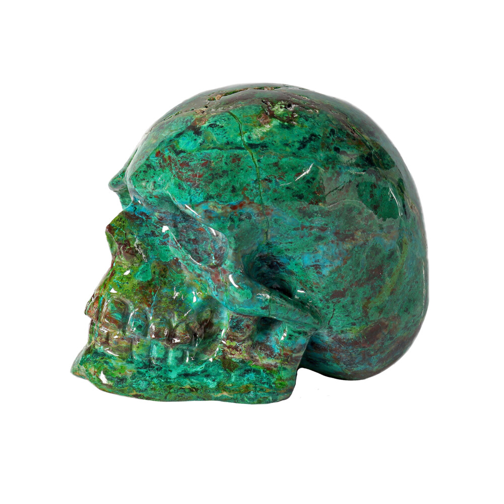 <span style="position: initial; margin: initial;"></span><span style="font-family: "EB Garamond"; position: initial; margin: initial;"><font size="4">Chrysocolla Malachite Carved Skull.</font></span><div style="position: initial; margin: initial;"><div style="position: initial; margin: initial;"><span style="font-family: "EB Garamond"; position: initial; margin: initial;"><font size="4"><p style="margin: initial; font-variant-numeric: normal; font-variant-east-asian: normal; font-stretch: normal; line-height: normal; font-family: "EB Garamond"; color: rgb(0, 0, 0); position: initial;"><span style="position: initial; margin: initial; font-family: "EB Garamond";">Chrysocolla </span>is often found interlaced with Malachite and/or Azurite, and</p><p style="margin: initial; font-variant-numeric: normal; font-variant-east-asian: normal; font-stretch: normal; line-height: normal; font-family: "EB Garamond"; color: rgb(0, 0, 0); position: initial;">our specimens are mined straight out of Arizona, but are also found in</p><p style="margin: initial; font-variant-numeric: normal; font-variant-east-asian: normal; font-stretch: normal; line-height: normal; font-family: "EB Garamond"; color: rgb(0, 0, 0); position: initial;">the Congo and other parts of the world where copper is prevalent. We</p><p style="margin: initial; font-variant-numeric: normal; font-variant-east-asian: normal; font-stretch: normal; line-height: normal; font-family: "EB Garamond"; color: rgb(0, 0, 0); position: initial;">carry specimens that are “gem-silica” mined from Globe, material</p><p style="margin: initial; font-variant-numeric: normal; font-variant-east-asian: normal; font-stretch: normal; line-height: normal; font-family: "EB Garamond"; color: rgb(0, 0, 0); position: initial;">interlaced with Malachite from Morenci, and ore mixed with specular</p><p style="margin: initial; font-variant-numeric: normal; font-variant-east-asian: normal; font-stretch: normal; line-height: normal; font-family: "EB Garamond"; color: rgb(0, 0, 0); position: initial;">hematite from Wickenburg. Chrysocolla is a secondary copper mineral,</p><p style="margin: initial; font-variant-numeric: normal; font-variant-east-asian: normal; font-stretch: normal; line-height: normal; font-family: "EB Garamond"; color: rgb(0, 0, 0); position: initial;">forming in the surrounding matrix of copper. A very gentle stone, its</p><p style="margin: initial; font-variant-numeric: normal; font-variant-east-asian: normal; font-stretch: normal; line-height: normal; font-family: "EB Garamond"; color: rgb(0, 0, 0); position: initial;">energy works in a passive, harmonious way. It can help soothe nervous</p><p style="margin: initial; font-variant-numeric: normal; font-variant-east-asian: normal; font-stretch: normal; line-height: normal; font-family: "EB Garamond"; color: rgb(0, 0, 0); position: initial;">tension, ease fear, anxiety, and guilt. It is also used to communicate with</p><p style="font-variant-numeric: normal; font-variant-east-asian: normal; font-stretch: normal; line-height: normal; font-family: "EB Garamond"; color: rgb(0, 0, 0); position: initial; margin: initial;">the spiritual feminine forces of the Earth.</p></font></span></div></div> Chrysocolla Malachite Carved Skull