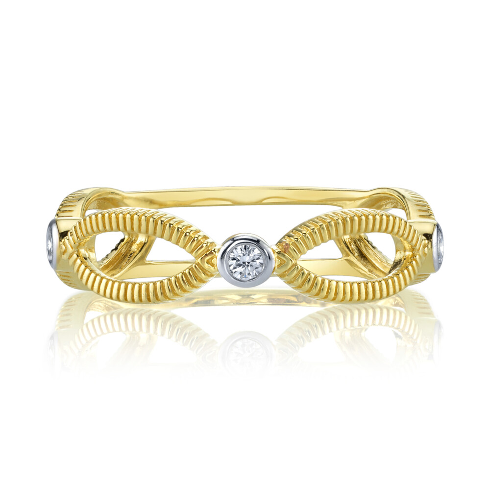 SLOANE STREET SINGLE ROW OPEN MARQUISE BAND RING IN 18K YELLOW GOLD FEATURES SPARKLING BEZEL SET DIAMOND STATIONS AND ELONGATED SIGNATURE STRIE TEXTURED MARQUISES CREATING A CASUAL TWO-TONE LOOK. THIS STACKER IS A BEAUTIFUL STAND-ALONE BAND OR PERFECT TO ADD DEPTH TO YOUR STACK. Open Marquis Ring With Diamonds