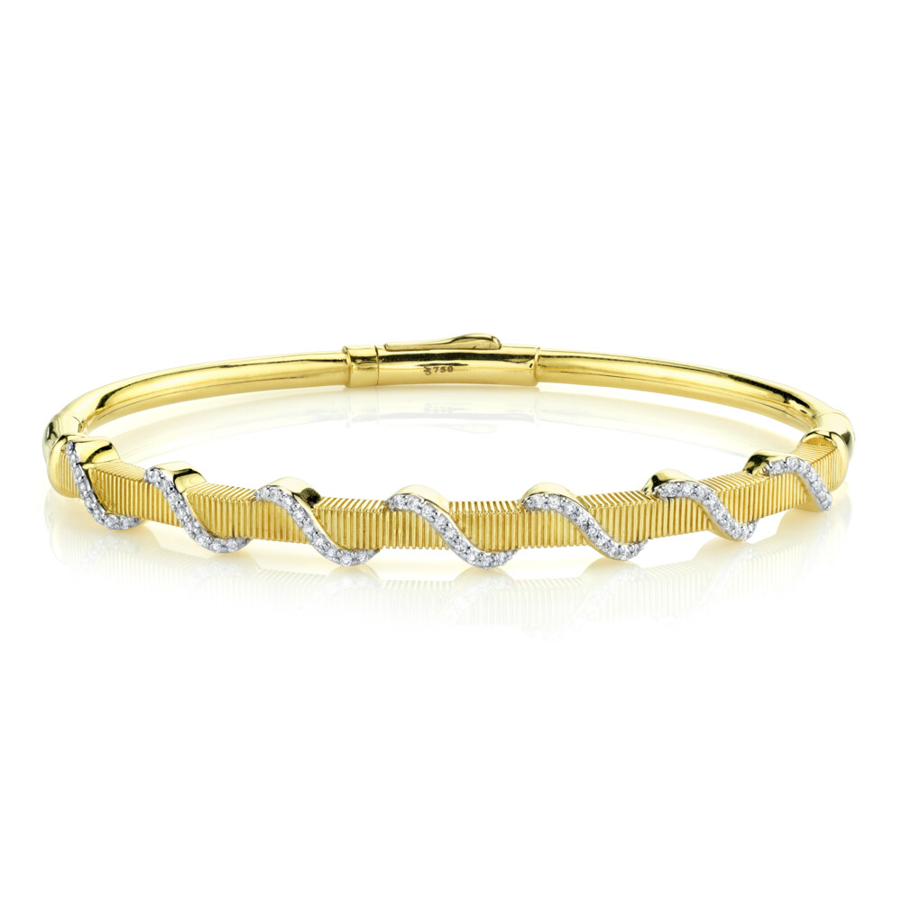 <span style="font-size: 16.8px; position: initial; margin: initial;">SLOANE STREET PAVE DIAMOND WRAP BRACELET IN 18K YELLOW GOLD FEATURES SIGNATURE STRIE TEXTURED BODY WITH RIBBONS OF PAVE WHITE DIAMONDS WITH DOUBLE HINGE AND HIDDEN LOCKING CLASP. THIS UPDATED CLASSIC PIECE IS THE PERFECT ADD-ON TO YOUR ELEGANT BRACELET STACK.</span> Diamond Wrapped Strie Bangle
