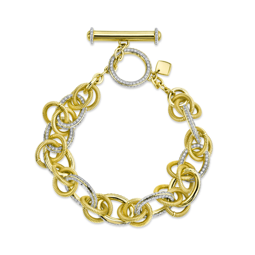 SIGNATURE SLOANE STREET PAVE WHITE DIAMOND LINK BRACELET IN 18K YELLOW GOLD WITH STRIE MULTI-LINK DETAILS AND WHITE DIAMOND TOGGLE CLOSURE IS THE STAPLE BRACELET YOU’VE BEEN SEARCHING FOR, SO LOOK NO FURTHER! THIS UPDATED TAKE ON A CLASSIC TREND WILL SURLY BE IN YOUR WARDROBE FOR YEARS TO COME. Pave Diamond And Strie Link Bracelet With Toggle