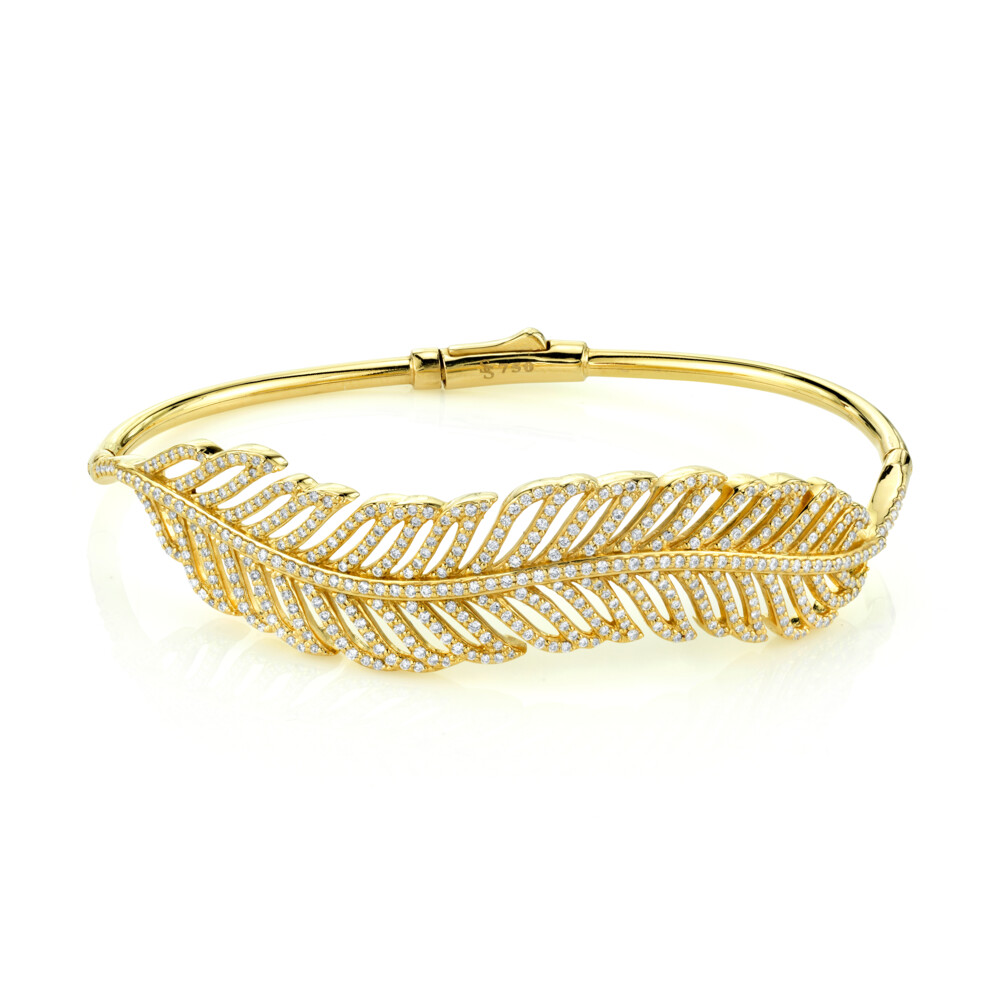 NO FEATHERS RUFFLED HERE! THIS STATEMENT RUFFLED PAVE DIAMOND FEATHER BANGLE BRACELET WRAPS YOUR WRIST WITH EFFORTLESS MOVEMENT. WEAR IT STACKED OR ON ITS OWN AS THE ESENTIAL DAY-TO-NIGHT PIECE WITH DOUBLE HINGE CLOSURE 18K YELLOW GOLD. Pave Diamond Feather Bangle