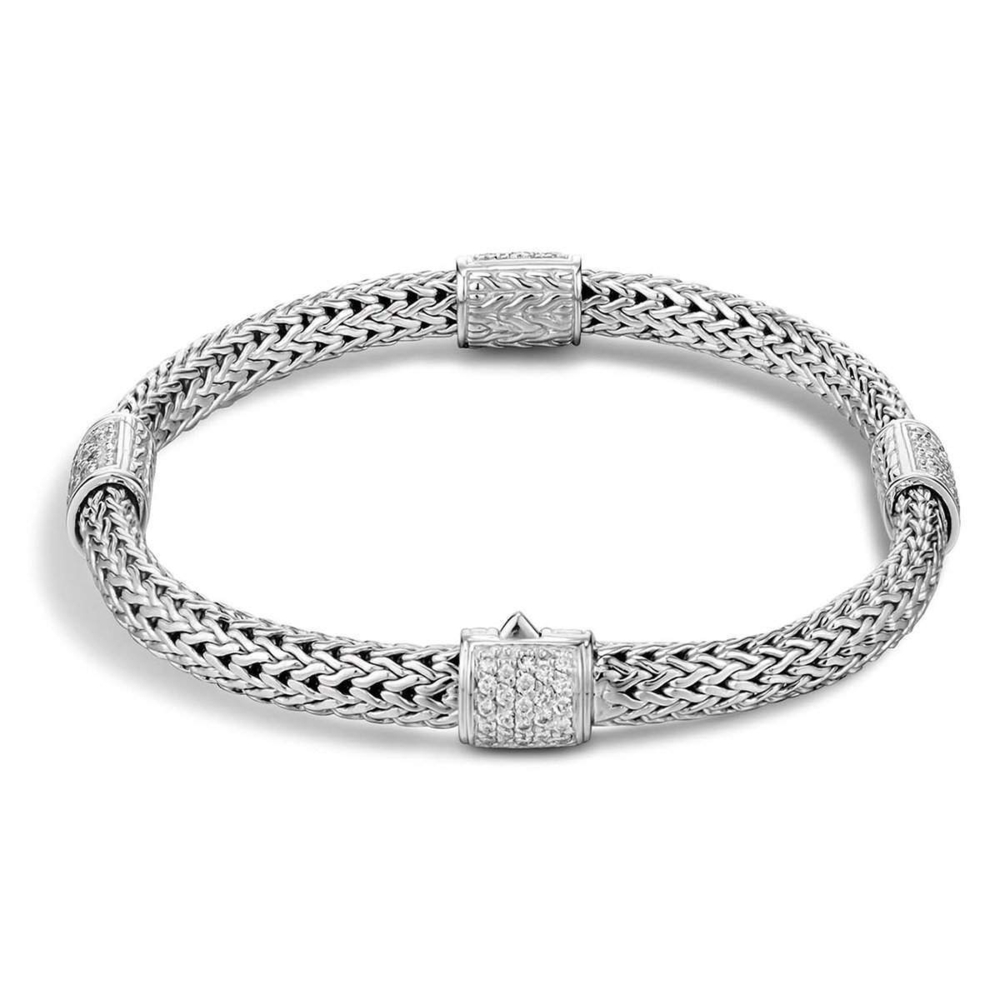 Sterling silver woven chain with diamonds. .73 ctw Classic Chain Four-Station Bracelet Sterling Silver with Diamonds