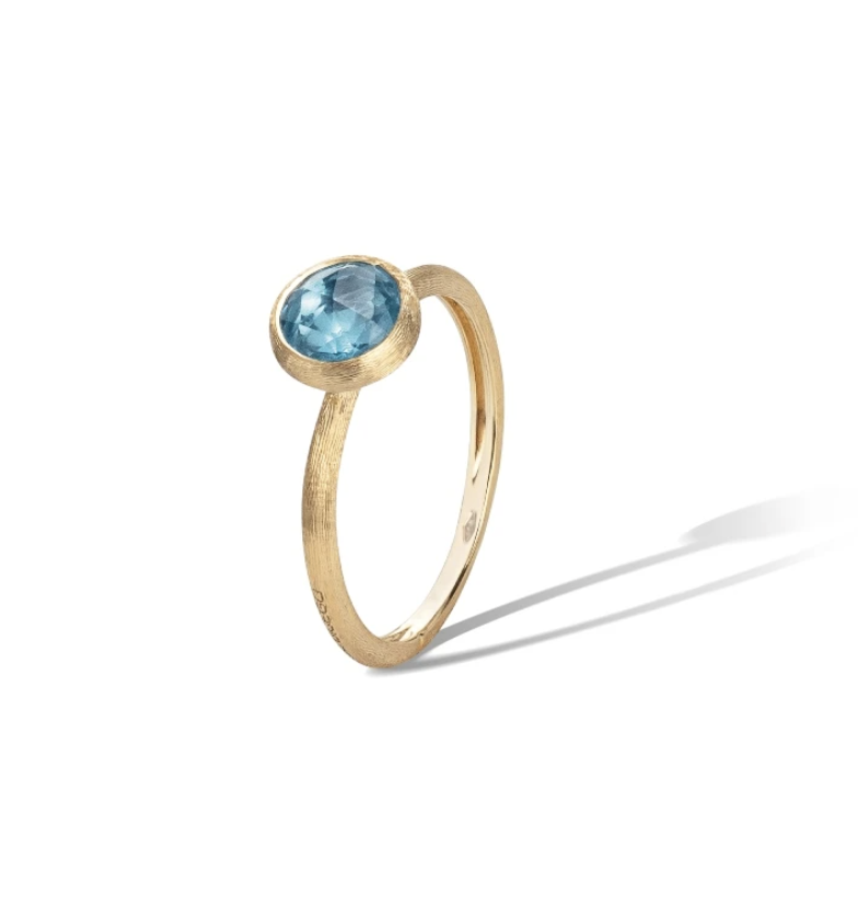 18K yellow gold stackable ring with rose cut cushion blue topaz. Inspired by a tropical Indian sunset and the stone-cutting heritage of Jaipur, this Jaipur Color Multicolor Gemstone Ring is hand engraved by Italian artisans. 18K Yellow Gold & Blue Topaz Stackable Ring