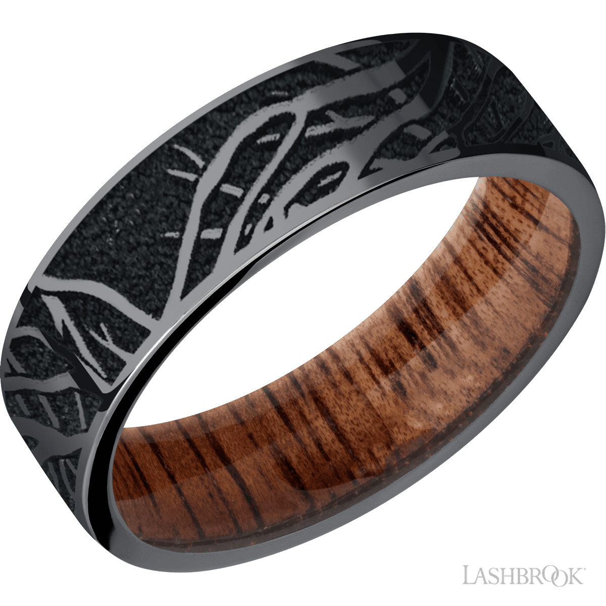 Closeup photo of Tantalum Band With a Hardwood Sleeve & Laser Carved Branches