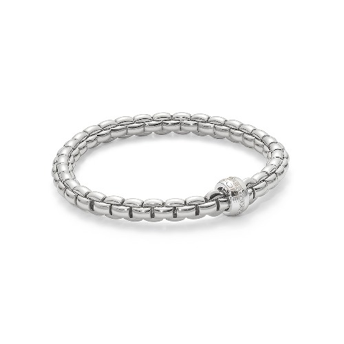 <div style="position: initial; margin: initial;"><span style="position: initial; margin: initial;"><div style="margin: initial; position: initial;">Eka – meaning ‘one’ in Sanskrit – is a whole new way of wearing gold bracelets. Based on one of Fope’s inventions from the 1950s, this applies the concept of flexibility to jewelry, blending together luxury and innovation. With its classic gold mesh design reworked in ultra-contemporary style, Flex’it has been proven a global success. Each bracelet has over 100 tiny 18k gold coils set into the interior of the link that allows the bracelet to expand and contract, rolling perfectly onto your wrist with ease. Handcrafted in Italy using 18k Gold and Diamonds, This Eka Flex'It Bracelet in size Small features a Single Line of Diamonds Rondel that contains 0.18tcw. To find your size, measure the circumference of your wrist using a flexible material such as a piece of thread or a strip of paper, and measure it against a ruler. Choose the corresponding size based in centimeters. To convert inches to centimeters, multiply the measurement of inches by 2.54.<br style="position: initial; margin: initial;"></div></span></div> Eka Flex'it White Gold Diamond Bracelet