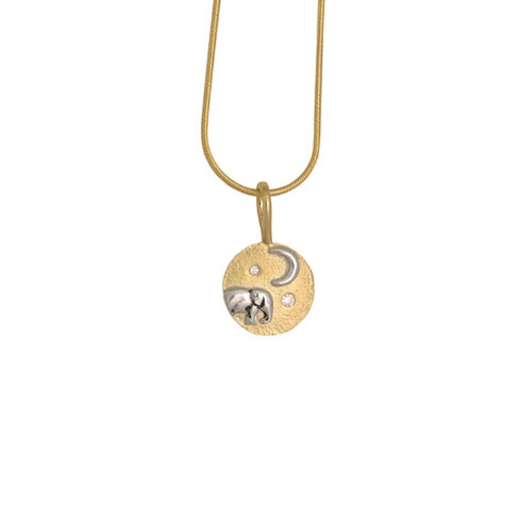 A silver baby elephant emerges onto a platform of 18K gold underneath the twinkling diamond starred sky. Elephant baby and moon pendant