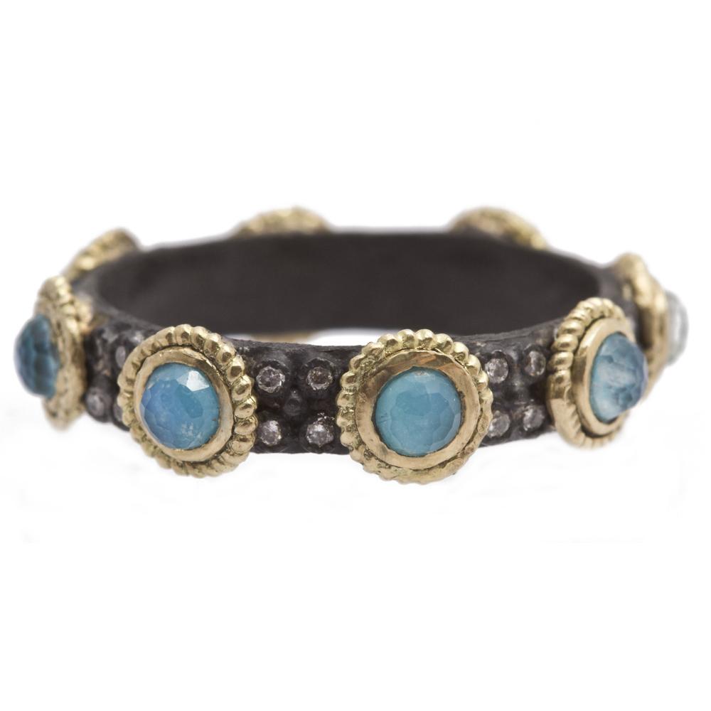 <div style="position: initial; margin: initial;">This beautiful blue turquoise and rainbow moonstone doublet eternity ring by Armenta is designed and manufactured by women in Houston, Texas. Made with 18k yellow gold and an oxidized sterling silver for a striking mixed metal look, this ring will play well with others stacked. Also exhibiting four diamond stations in between every doublet station, this ring has enough dimension and beauty to hold on its own. <br style="position: initial; margin: initial;"></div> Old World Blue Turquoise Sterling Silver Ring