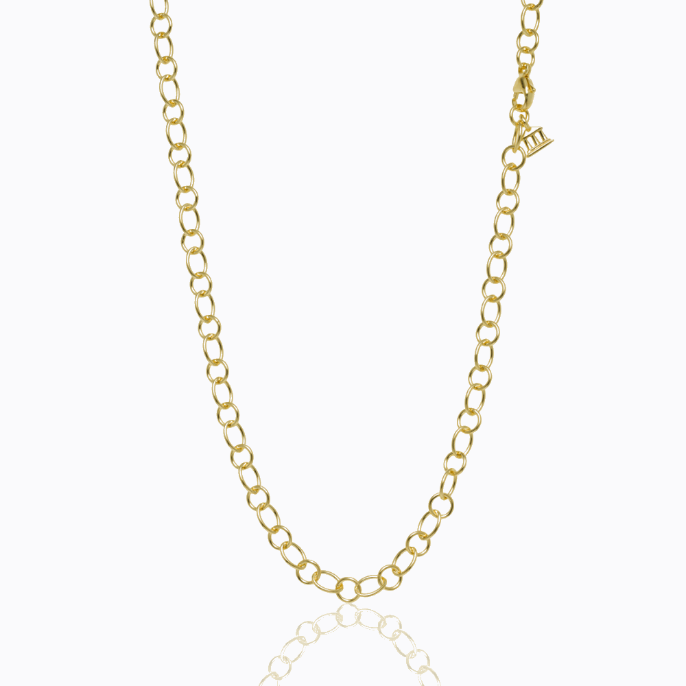 This 32" 18 karat yellow gold ribbon chain is simple yet elegant. Heavy for its look, this chain can be wrapped twice or worn long. Either way, this chain is beautiful and versatile. 18K Ribbon Chain