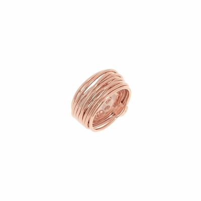 Thin DNA Spring Ring. Sterling Silver with an 18K Rose Gold Vermeil. Ring includes butterfly sizing tines along interior of ring for easy sizing. Thin DNA Spring Ring - Rose Gold