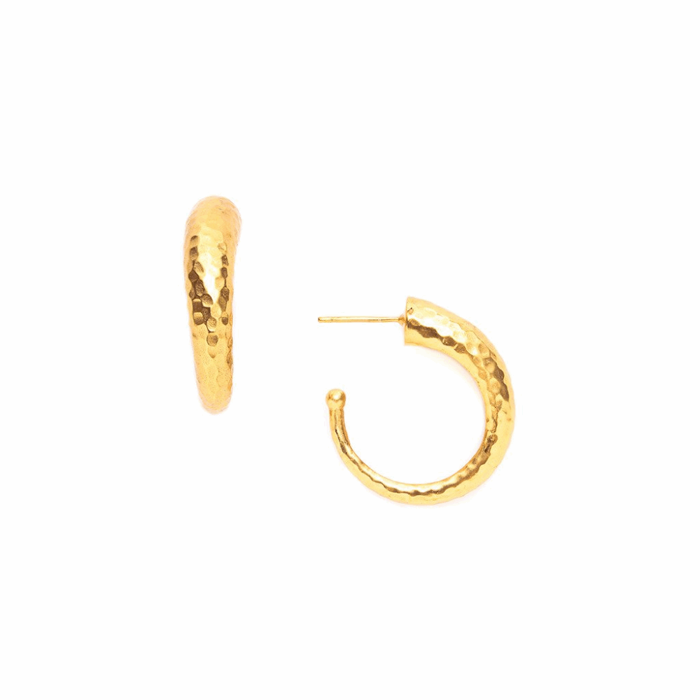 Glossy hammered hoop goes from thick to slender as it curves around. 24K gold plate. Hammered Hoop