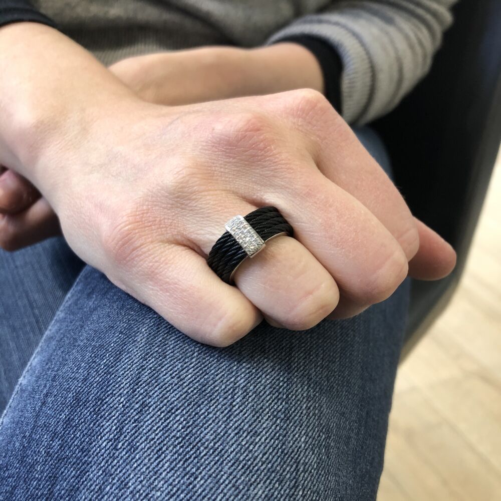 This noir heat treated steel cable and diamond bar ring is a great addition to your jewelry collection! Displaying a total carat weight of .16 carats in diamonds, its unique yet stylish character makes it the perfect fit for anyone looking for a unique and bold ring. Diamond Bar Ring