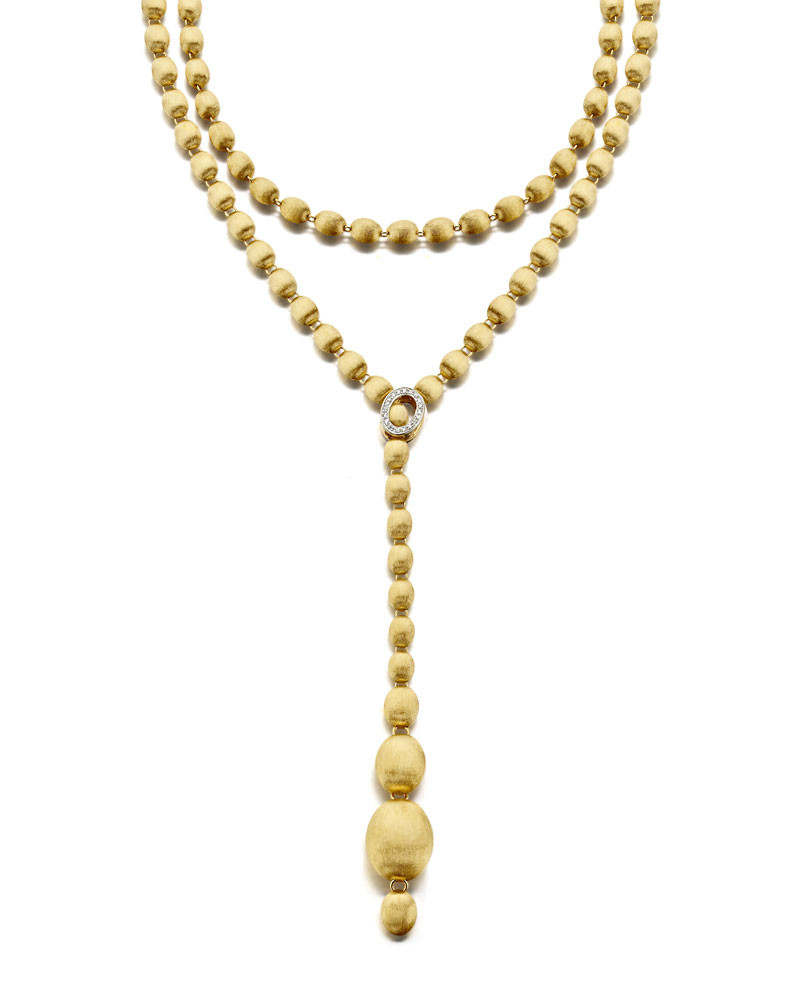 This Ivy necklace in 18kt yellow gold and diamonds is made from elegant gold pearls, hand-engraved one by one with the very ancient burin technique and surprisingly light. Versatile in style, wear as a long chain or Lariat, double or triple the strands around your neck or down your back. It's easily the sexiest most versatile necklace you can own.<div style="position: initial; margin: initial;"><br style="position: initial; margin: initial;"></div><div style="position: initial; margin: initial;"><span style="color: rgb(0, 0, 0); font-size: medium; font-family: Montserrat, sans-serif; position: initial; margin: initial;">IVY is an embracing and unique jewel, a contemporary must-have.</span><br style="color: rgb(0, 0, 0); font-size: medium; margin: initial; padding: 0px; font-family: Montserrat, sans-serif; position: initial;"><span style="color: rgb(0, 0, 0); font-size: medium; font-family: Montserrat, sans-serif; position: initial; margin: initial;">To characterize this necklace in 18kt gold and diamonds, its elegant gold pearls, hand-engraved one by one with the very ancient burin technique and surprisingly light.</span><br style="color: rgb(0, 0, 0); font-size: medium; margin: initial; padding: 0px; font-family: Montserrat, sans-serif; position: initial;"><br style="color: rgb(0, 0, 0); font-size: medium; margin: initial; padding: 0px; font-family: Montserrat, sans-serif; position: initial;"><span style="color: rgb(0, 0, 0); font-size: medium; font-family: Montserrat, sans-serif; position: initial; margin: initial;">Have fun interpreting this jewel, adapting it to your look and experiencing its infinite possibilities, from the most classic to the most sensual.</span><br style="color: rgb(0, 0, 0); font-size: medium; margin: initial; padding: 0px; font-family: Montserrat, sans-serif; position: initial;"><br style="color: rgb(0, 0, 0); font-size: medium; margin: initial; padding: 0px; font-family: Montserrat, sans-serif; position: initial;"><br style="color: rgb(0, 0, 0); font-size: medium; margin: initial; padding: 0px; font-family: Montserrat, sans-serif; position: initial;"><span style="color: rgb(0, 0, 0); font-size: medium; font-family: Montserrat, sans-serif; position: initial; margin: initial;">Ref. CS32-538</span><br style="color: rgb(0, 0, 0); font-size: medium; margin: initial; padding: 0px; font-family: Montserrat, sans-serif; position: initial;"><span style="color: rgb(0, 0, 0); font-size: medium; font-family: Montserrat, sans-serif; position: initial; margin: initial;">Length 110,00 cm indossata lunga</span><br style="color: rgb(0, 0, 0); font-size: medium; margin: initial; padding: 0px; font-family: Montserrat, sans-serif; position: initial;"><br style="color: rgb(0, 0, 0); font-size: medium; margin: initial; padding: 0px; font-family: Montserrat, sans-serif; position: initial;"><span style="color: rgb(0, 0, 0); font-size: medium; font-family: Montserrat, sans-serif; position: initial; margin: initial;">La chiusura può essere agganciata a ciascuna delle boules in oro, in modo da dare la possibilità di indossarla nella misura desiderata.</span><br style="position: initial; margin: initial;"></div> Ivy Necklace