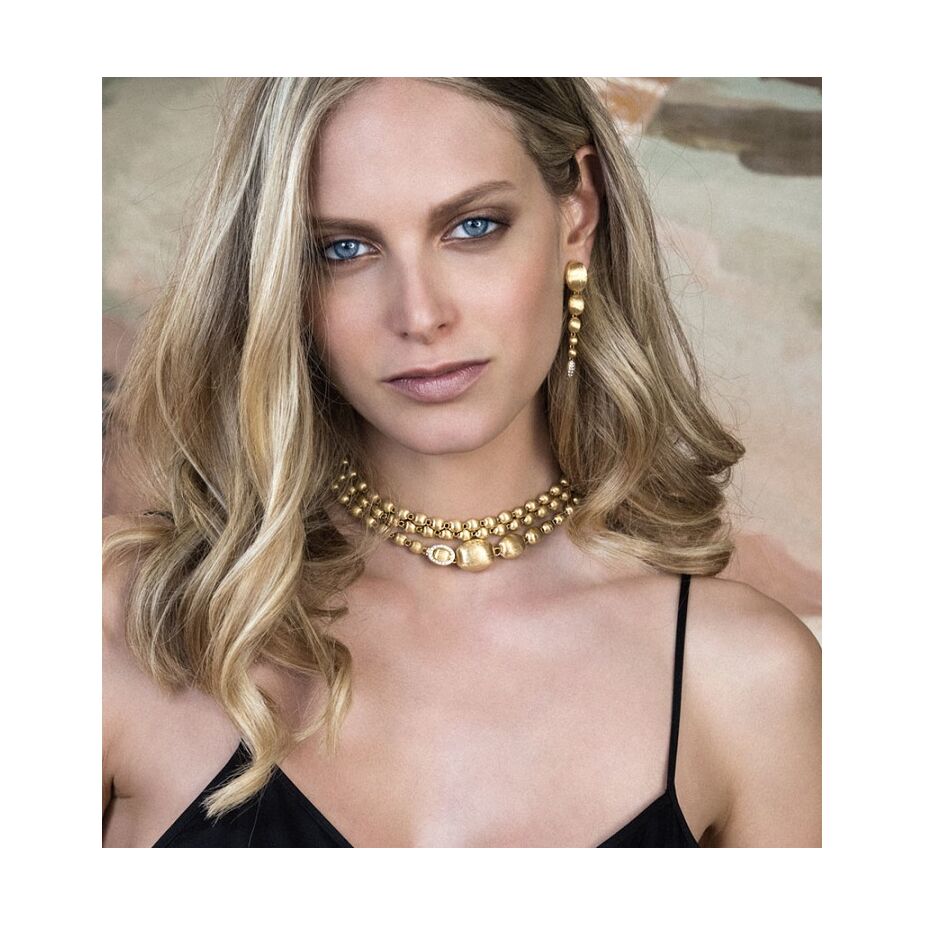 IVY earrings are made from 18kt gold and diamonds shaped into its elegant gold pearls, hand-engraved one by one with the very ancient burin technique and surprisingly light. Easy enough to wear every day. Ivy Diamond Drop Earrings