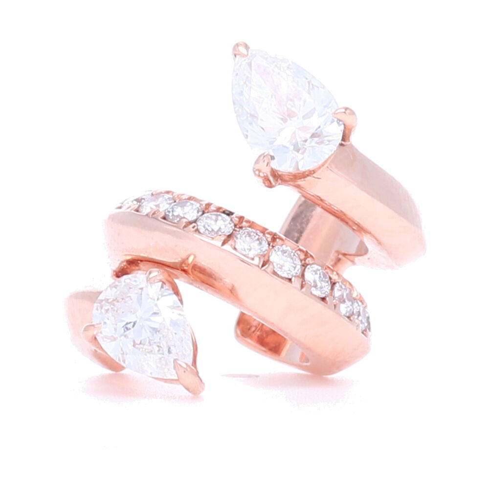 This 18k rose gold diamond ear cuff is highly unique and stylish. This cuff has a total carat weight of .54 and is perfect for those who want to add a little edge to their look. 18k Rose Gold Ear Cuff with Pear Shaped Diamonds