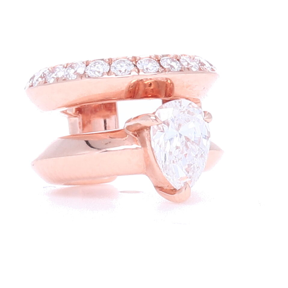 This 18k rose gold diamond ear cuff is highly unique and stylish. This cuff has a total carat weight of .33 and is perfect for those who want to add a little edge to their look. 18k Rose Gold Diamond Ear Cuff