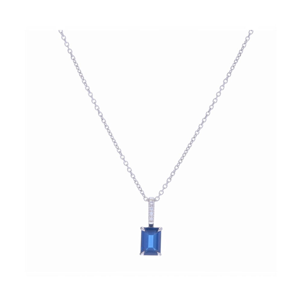 This dazzling emerald cut blue sapphire weighing a total of 1.08 carats is set into 18k white gold with a diamond pave on the bale. A perfect every day pendant - celebrate a September birthday for yourself or a loved one. Emerald Cut Blue Sapphire Pendant Necklace