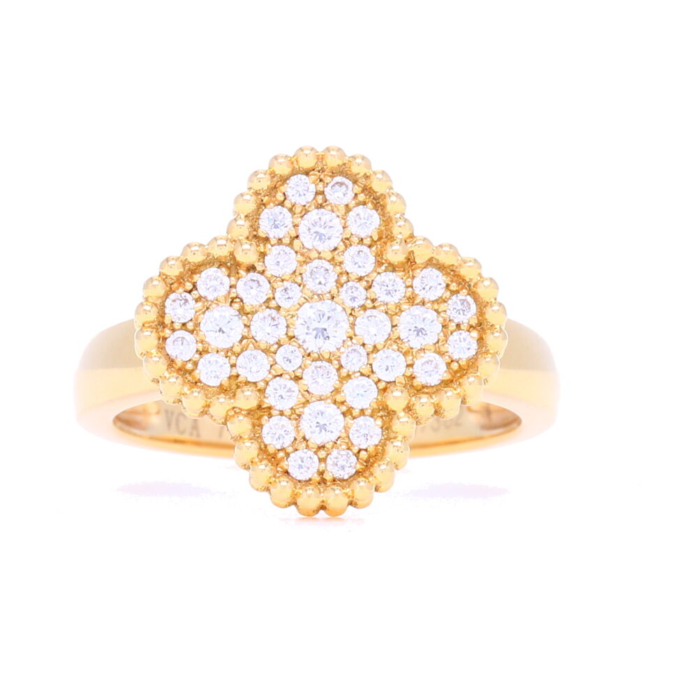 This 18k yellow gold clover motif ring is a true statement piece. With a total of .44 carats of diamonds, this piece sparkle and shines and is perfect for all occasions. This ring size is a 6 1/2 and is ready to become a part of your jewelry collection.<div>Diamond weight: 0.44ct</div> 18K Yellow Gold Clover Motif Ring
