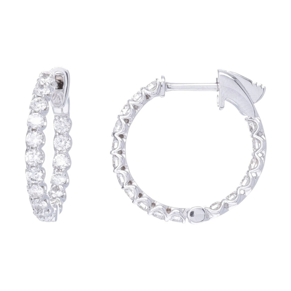 1.23 carats of diamonds are in these fun, every day hoop earrings set into 14k white gold. Easy to wear, great sparkle, no brainier. Shared Prong Round Diamond In & Out Round Shape Hoop Earrings