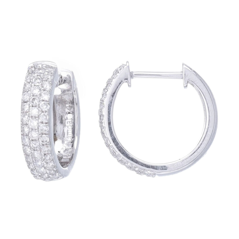 .6 carat total weight set in 3 rows of pave, makes this lovely every day 14k gold hoop earrings an instant favorite. Pave in front of earring only, lots of sparkle won't get lost in your hair. 3 Rows of Pave diamonds set on a rounded front hoop 1/2'' Hoop Earring