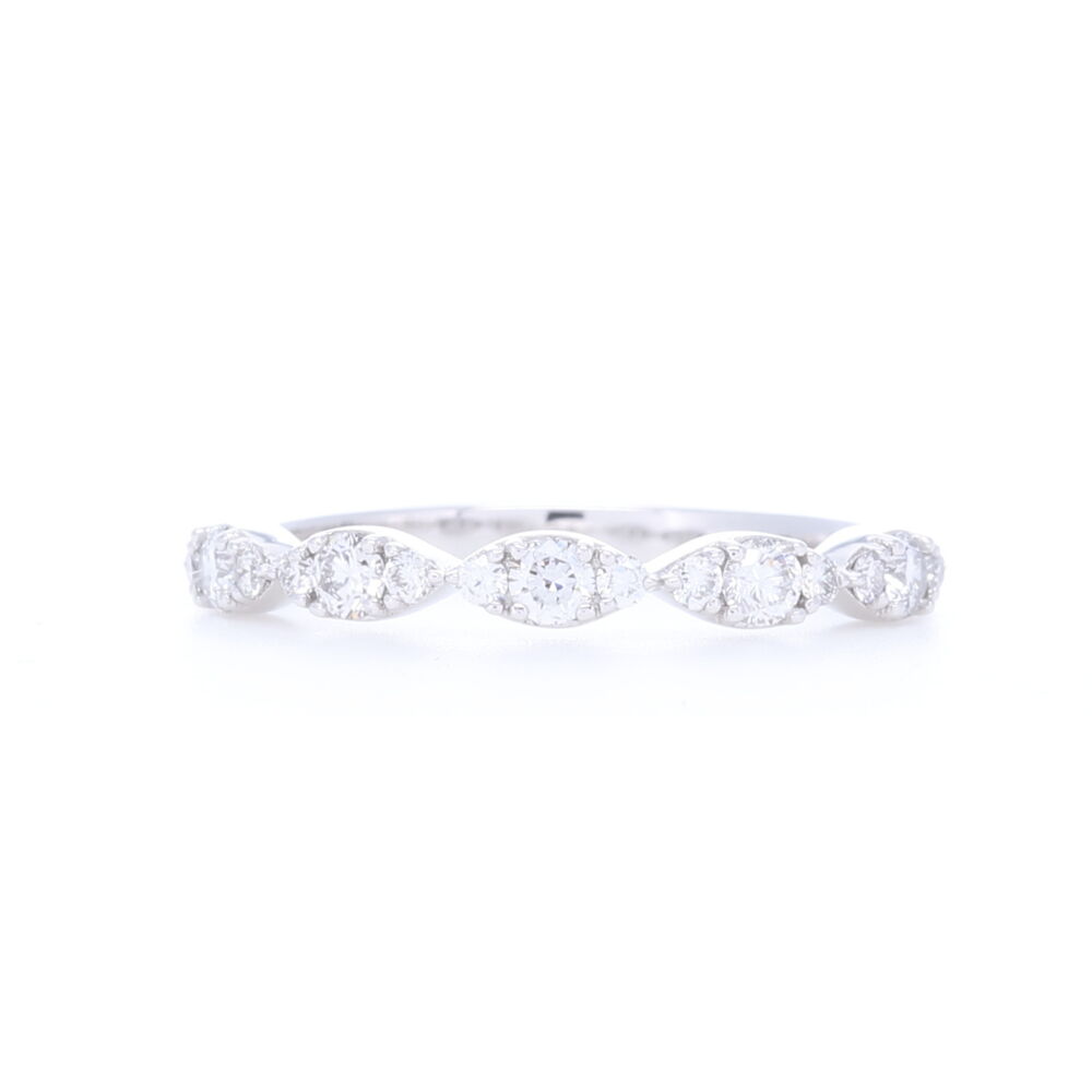 Alternating brilliant cut diamonds mimic the marquise look, in this stunning looking swooping marquise pattern. A great addition to any stack ring set. .32 carats of diamonds 14k Gold, Brilliant Diamonds in Marquise Prong Set Pattern Stack