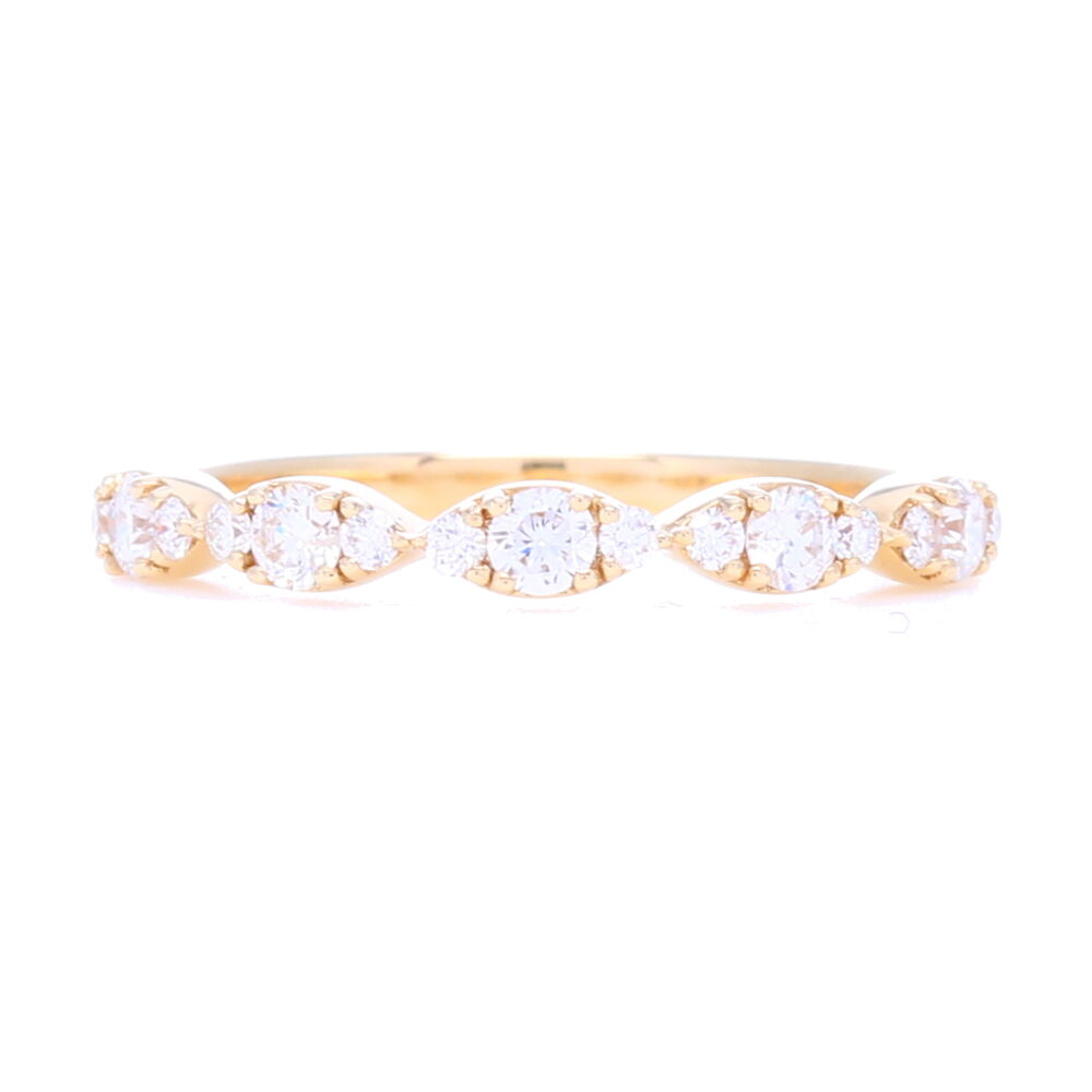 Alternating brilliant cut diamonds mimic the marquise look, in this stunning looking swooping marquise pattern. A great addition to any stack ring set. 32 carats of diamonds 14k Gold, Brilliant Diamonds in Marquise Prong Set Pattern Stack