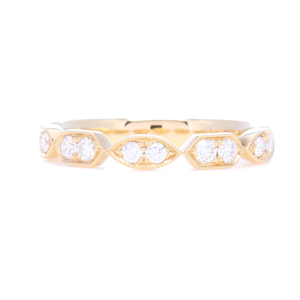 With .25 carats of diamonds set into this 14k yellow gold station pattern, it's all bling in the front and stops 1/2 way around. The diamonds really shine in this one! Prong Set Brilliant Cut Diamond Station Stack Ring