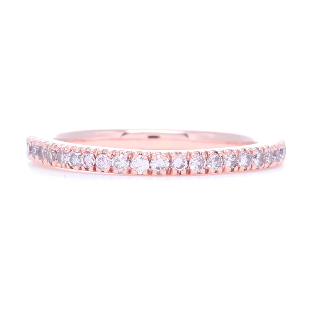.65 carats of pink diamonds are prong set in this 18k rose gold eternity stack band. 18k Rose Gold and Pink Diamond Prong Set Eternity Stack Ring
