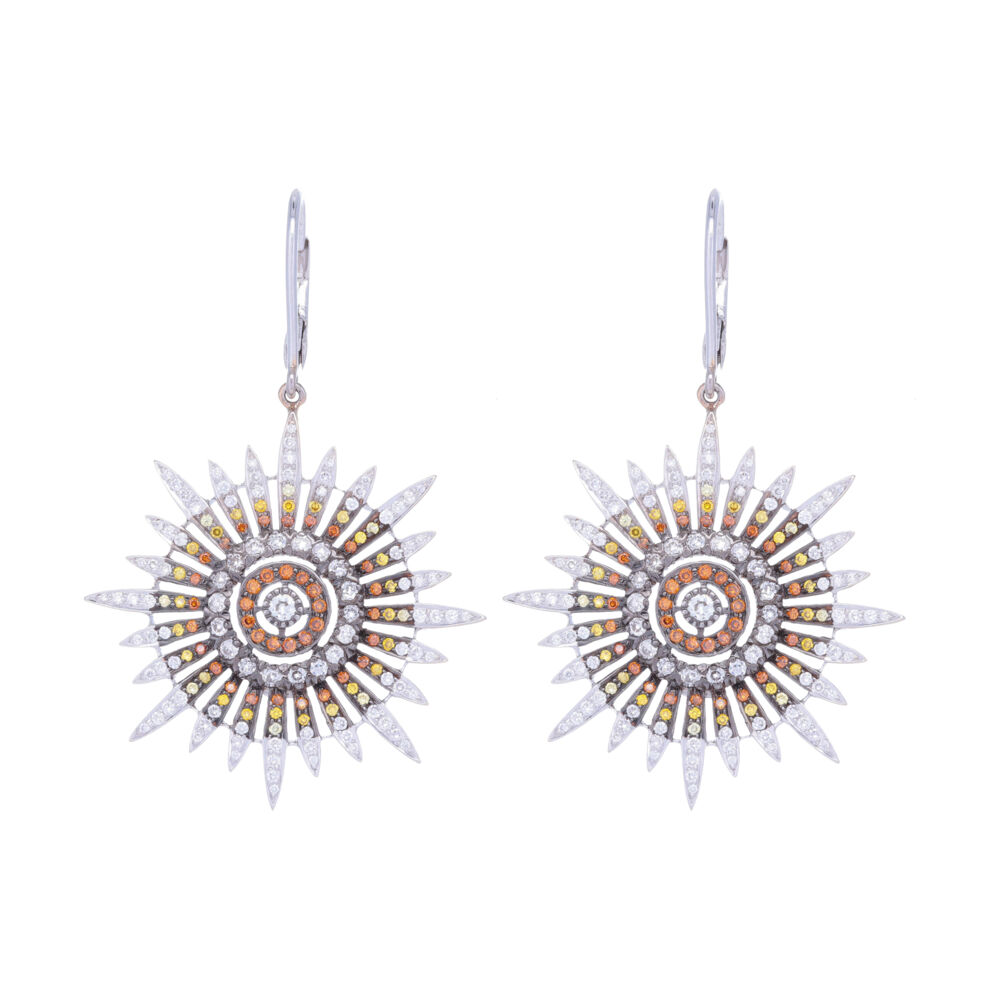 1.96ct carats of various color diamonds in a white to warm hue of yellows and oranges make for a stunning burst of color in a sun or star pattern. Set in 18k white gold, these earrings won't get lost in any hair color. White Yellow & Orange Diamond Star Earrings in 18k White Gold