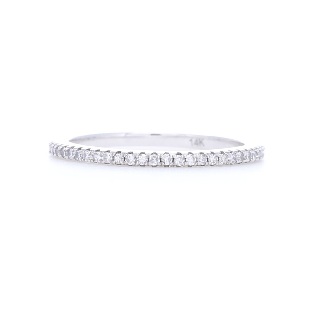 <font size="2">Need a simple stack ring to add a bit of sparkle but not overtake your finger? This brilliant-cut diamond eternity band is the answer to your needs. Approximately 0.4 carats of diamonds and set in strong 14k white gold as to not have to worry about losing diamonds. This will be one of your favorite rings to wear with your stacks. </font> Eternity Petite Stack Ring Band 14k White Gold with Diamonds