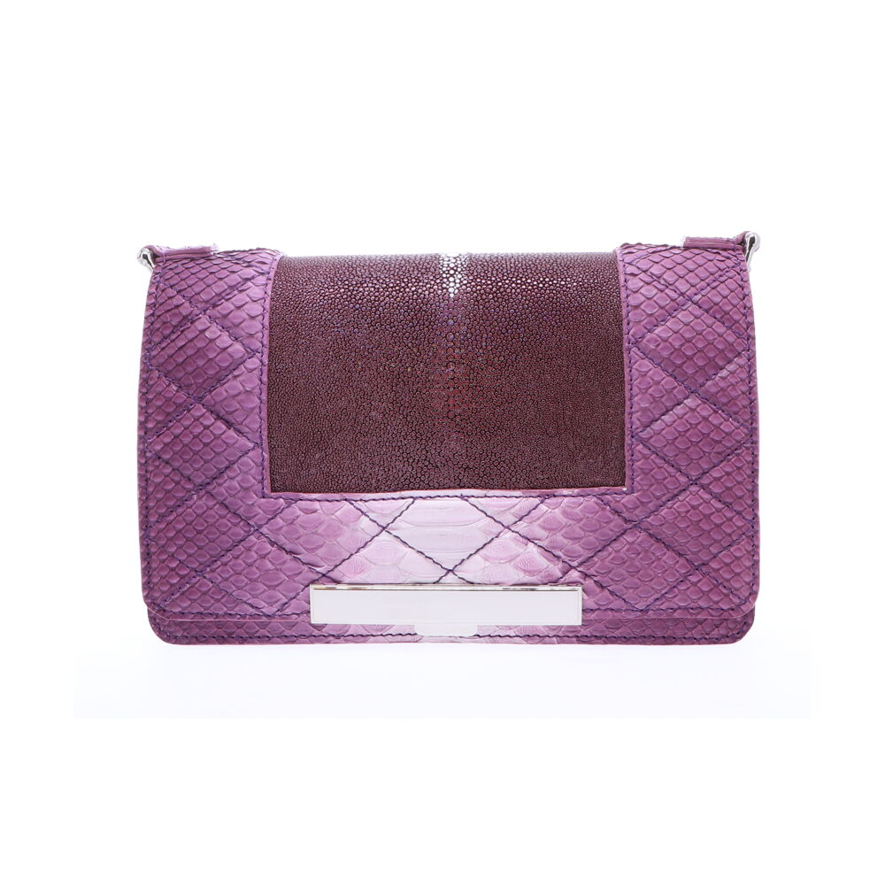 This ombre purple stingray and python chain bag is bold, elegant and fun. Whether going to meet up with friends for lunch or going out for a night out on the town, this versatile purse is perfect for every occasion. Ombre Purple Stingray and Python Chain Bag